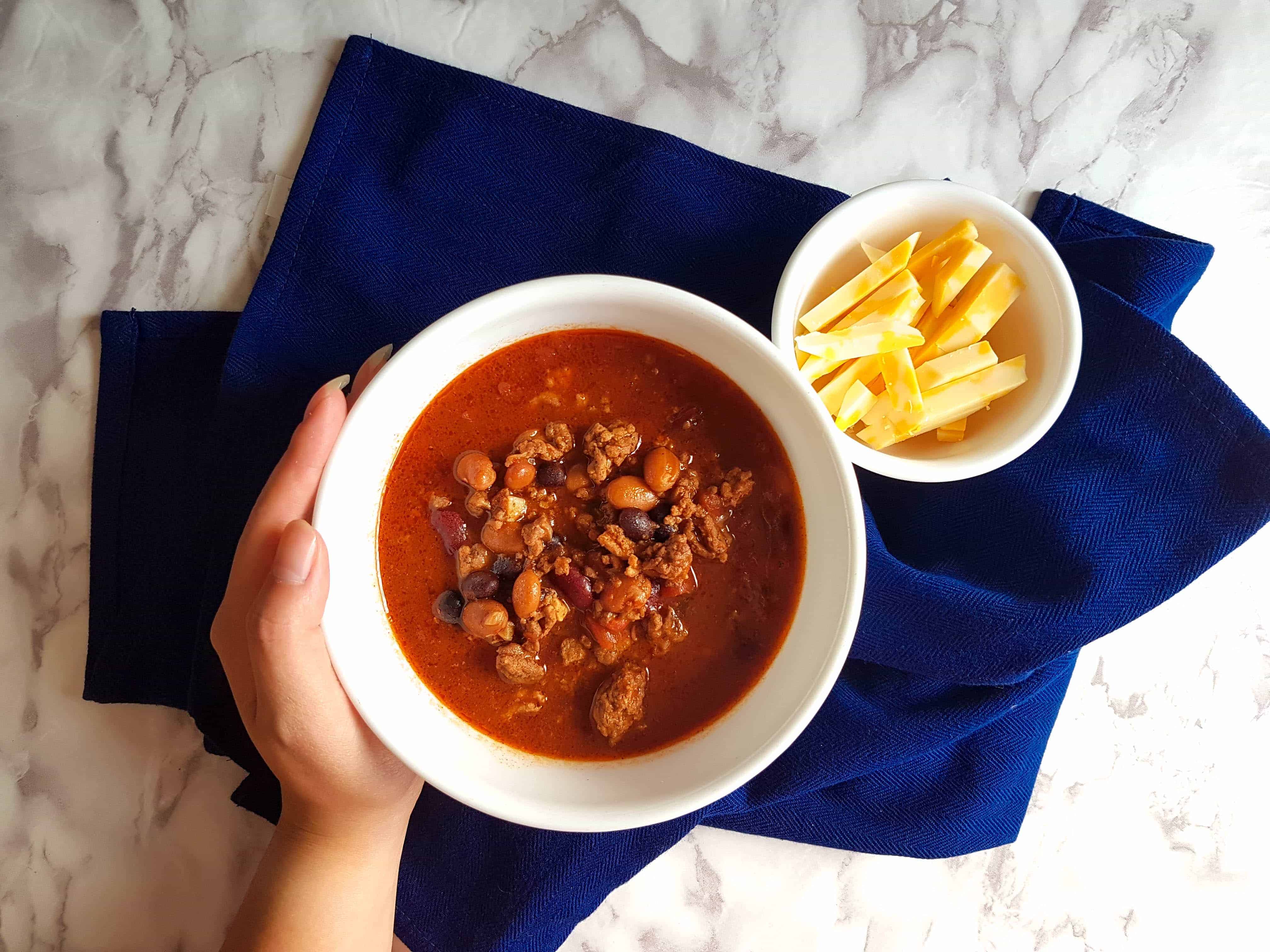 Easy Hearty Slow Cooker Pork And Beef Chili Carmy Run Eat Travel