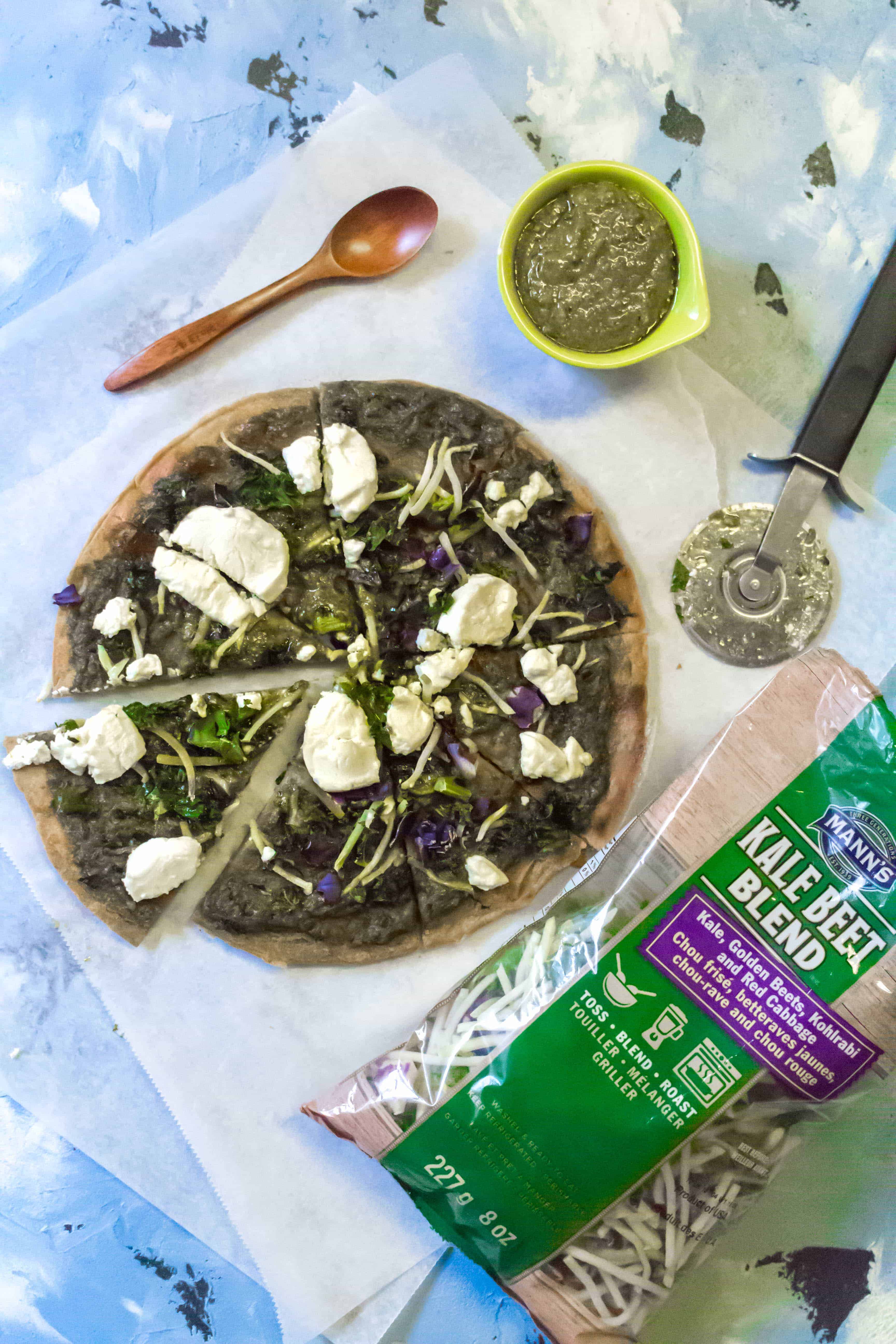 Craving some pizza but looking for a healthier alternative? Try this Kale Beet Pesto Pizza with a Chickpea Crust!