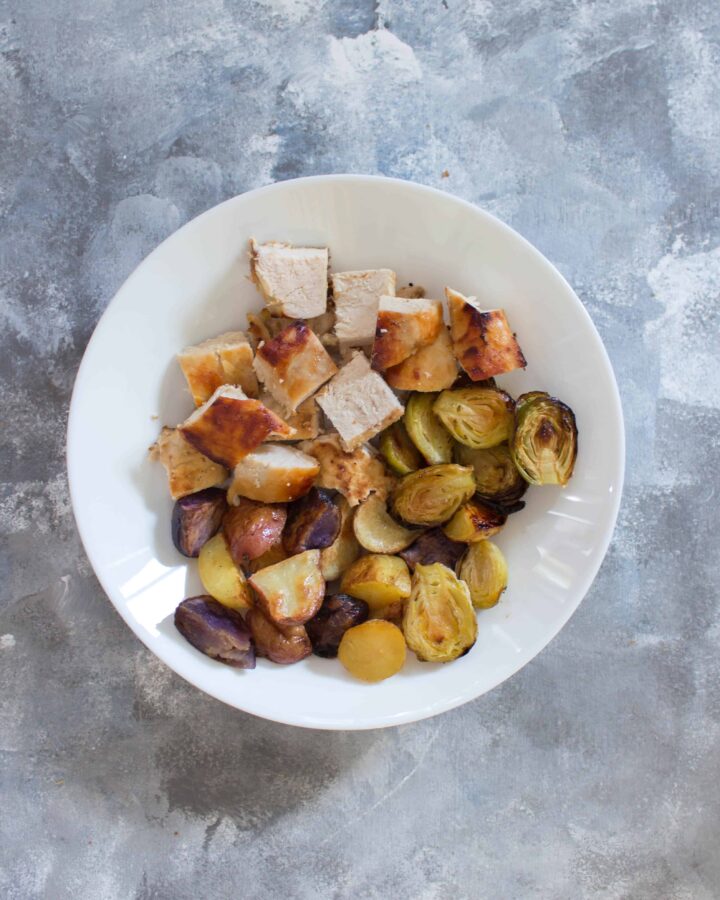 Sometimes a whole sheet pan dinner is just too much for my partner and I so today I have for you a dinner For two: Sheet Pan Honey Lemon Chicken with Roasted Potatoes and Brussel Sprouts using a convection toaster oven!