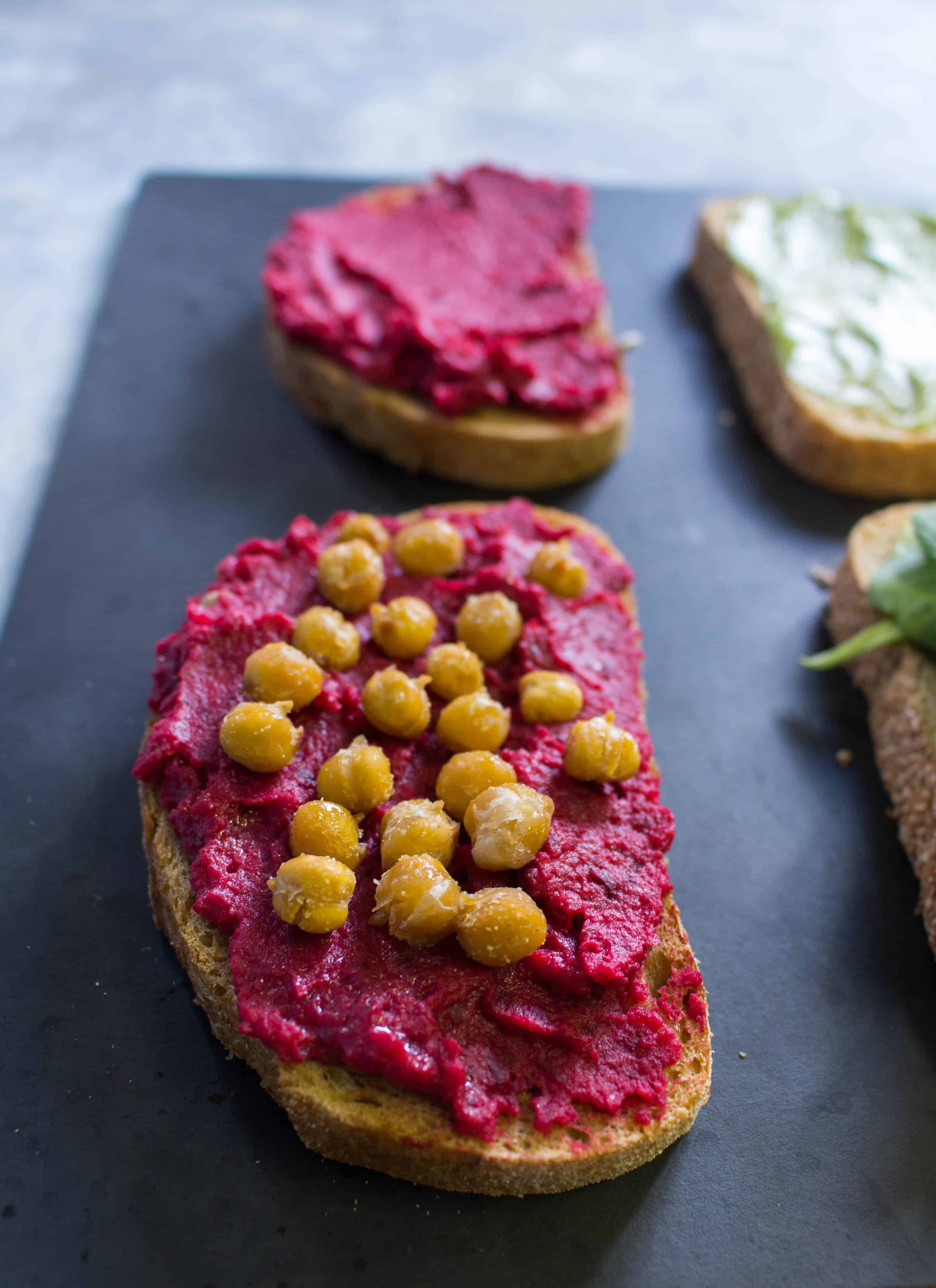 Work Week Lunch: Beet Hummus, Guacamole, Roasted Chickpea, and Spinach Sandwich 