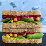 Work Week Lunch: Beet Hummus, Guacamole, Roasted Chickpea, and Spinach Sandwich
