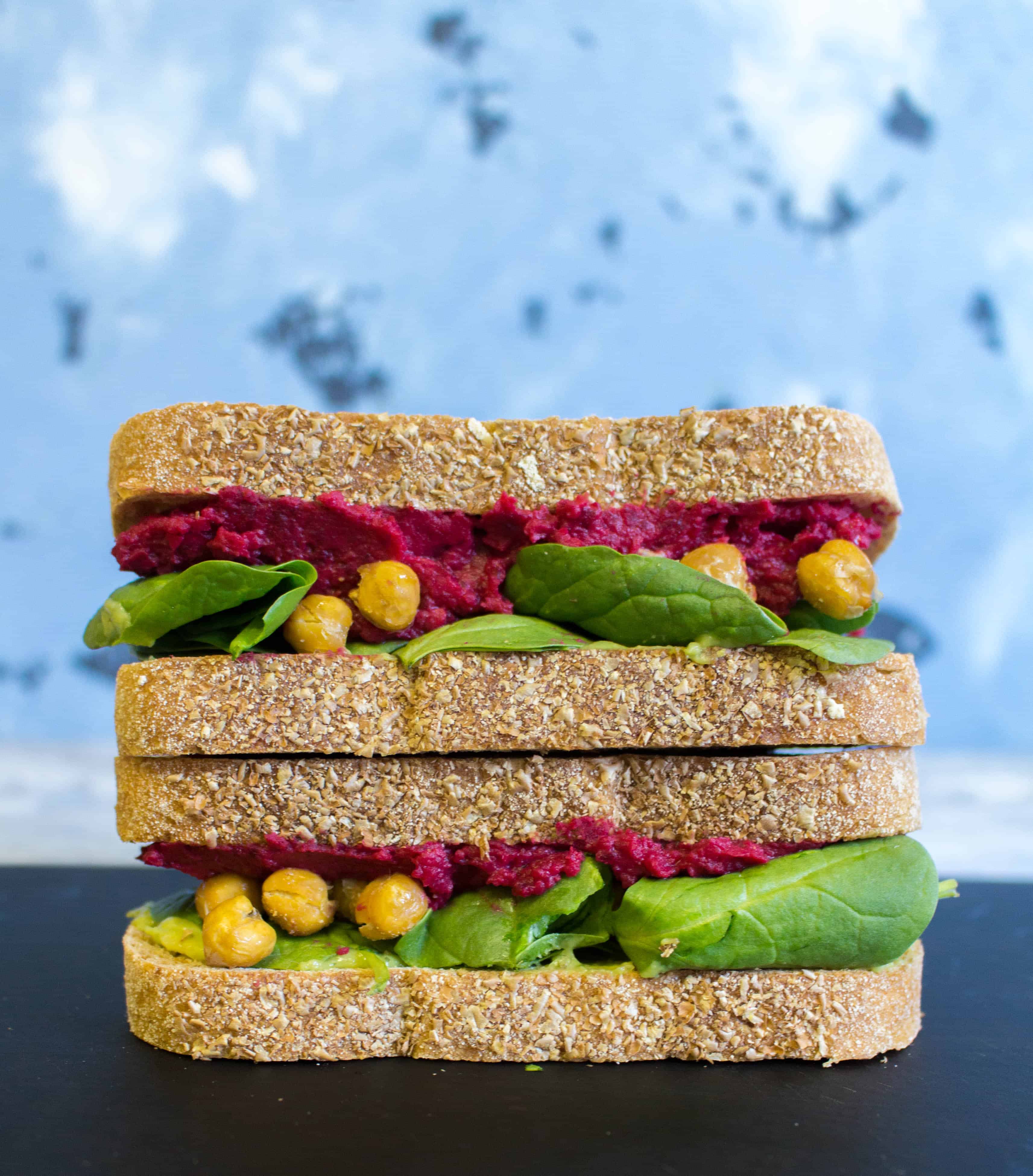 Work Week Lunch: Beet Hummus, Guacamole, Roasted Chickpea, and Spinach Sandwich 