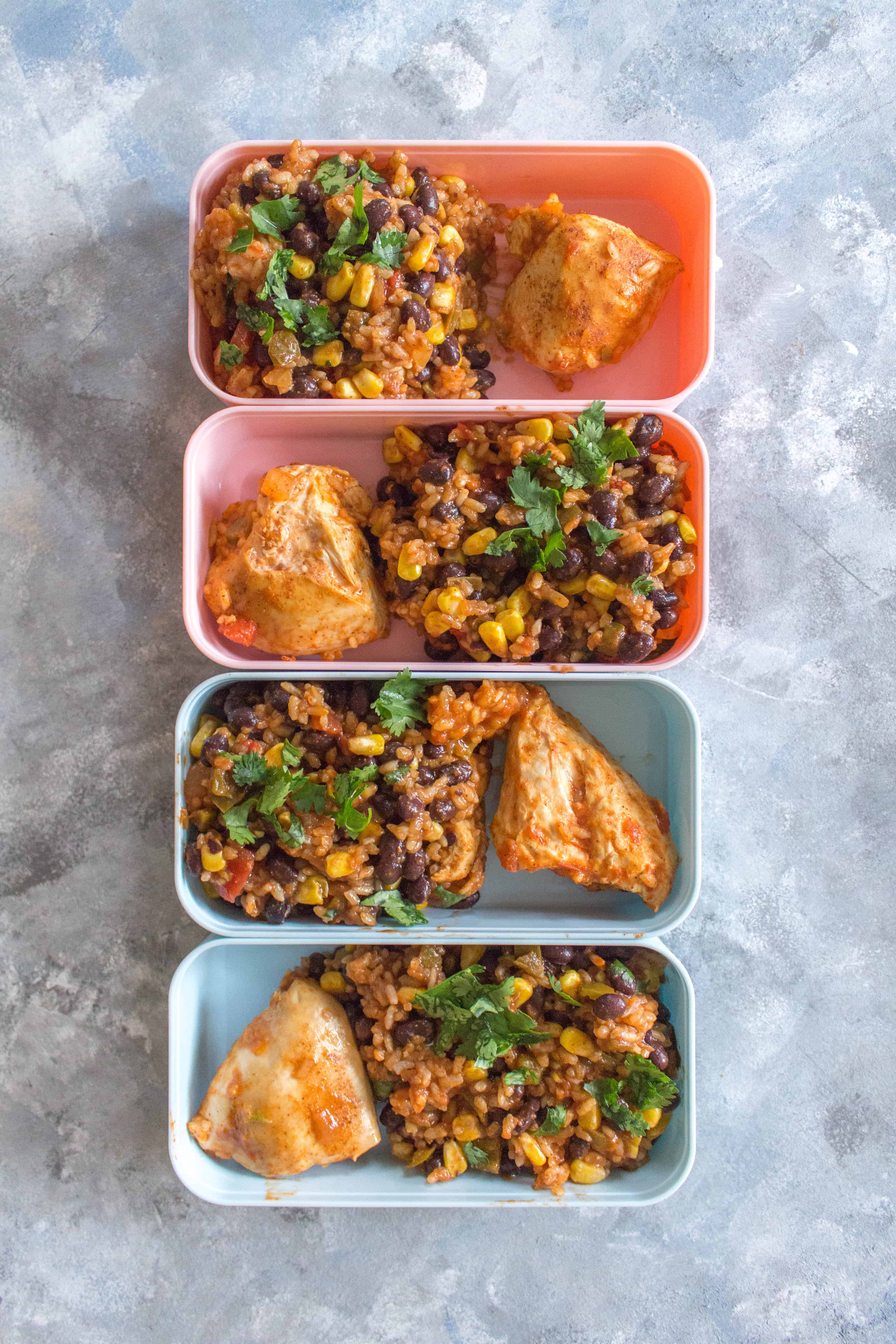 This Spicy Instant Pot Chicken and Rice Meal Prep is inspired by the chicken burrito bowls from Chipotle! It's so easy to make and takes less than 30 minutes to meal prep for four days!  #InstantPotRecipes #chickenrecipe #chipotlechicken