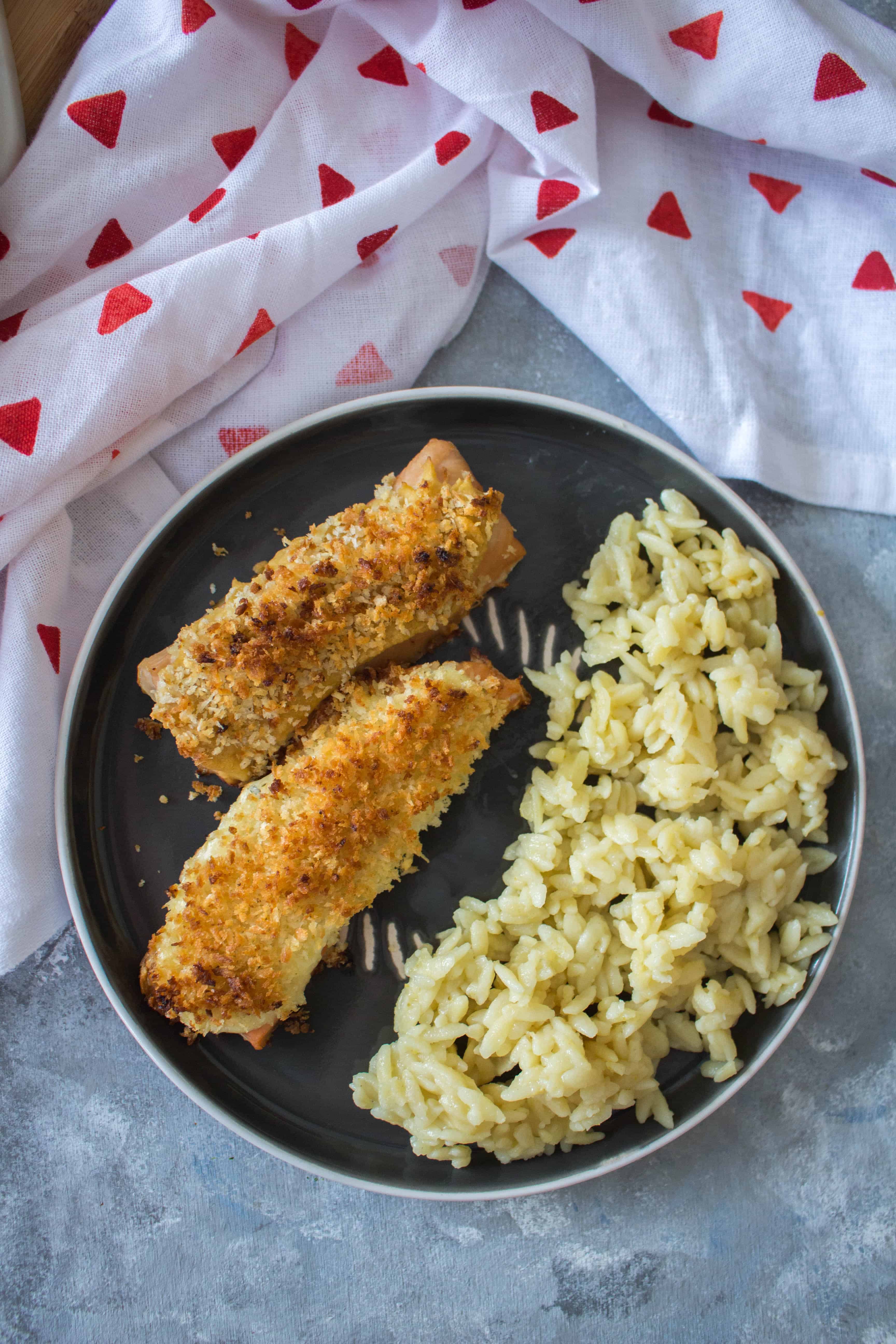 This delicious Hummus Crusted Salmon with Panko is baked to perfection! This Hummus Crusted Salmon is perfect for a healthy weeknight dinner and lunch meal prep with the leftovers.