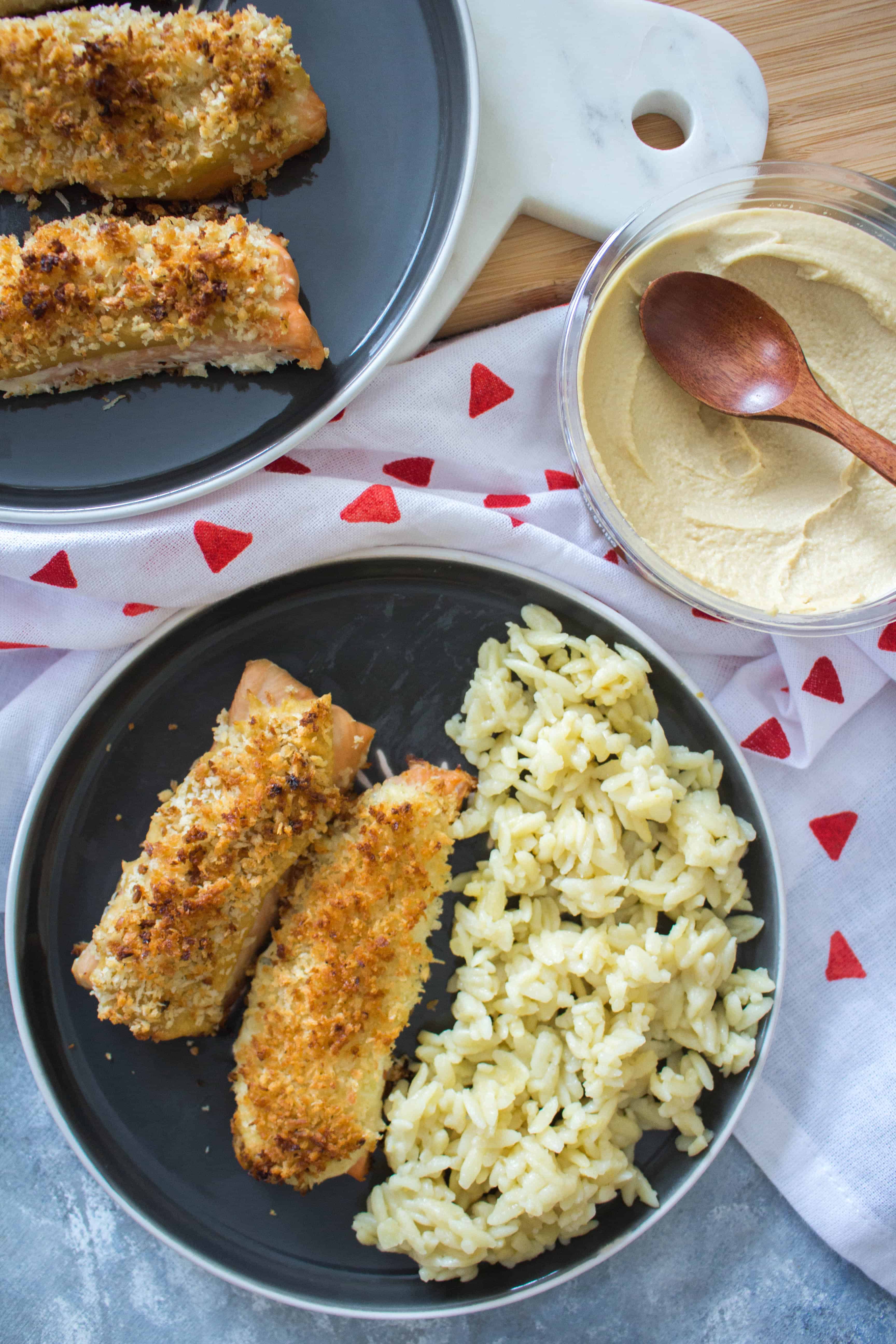 This delicious Hummus Crusted Salmon with Panko is baked to perfection! This Hummus Crusted Salmon is perfect for a healthy weeknight dinner and lunch meal prep with the leftovers.