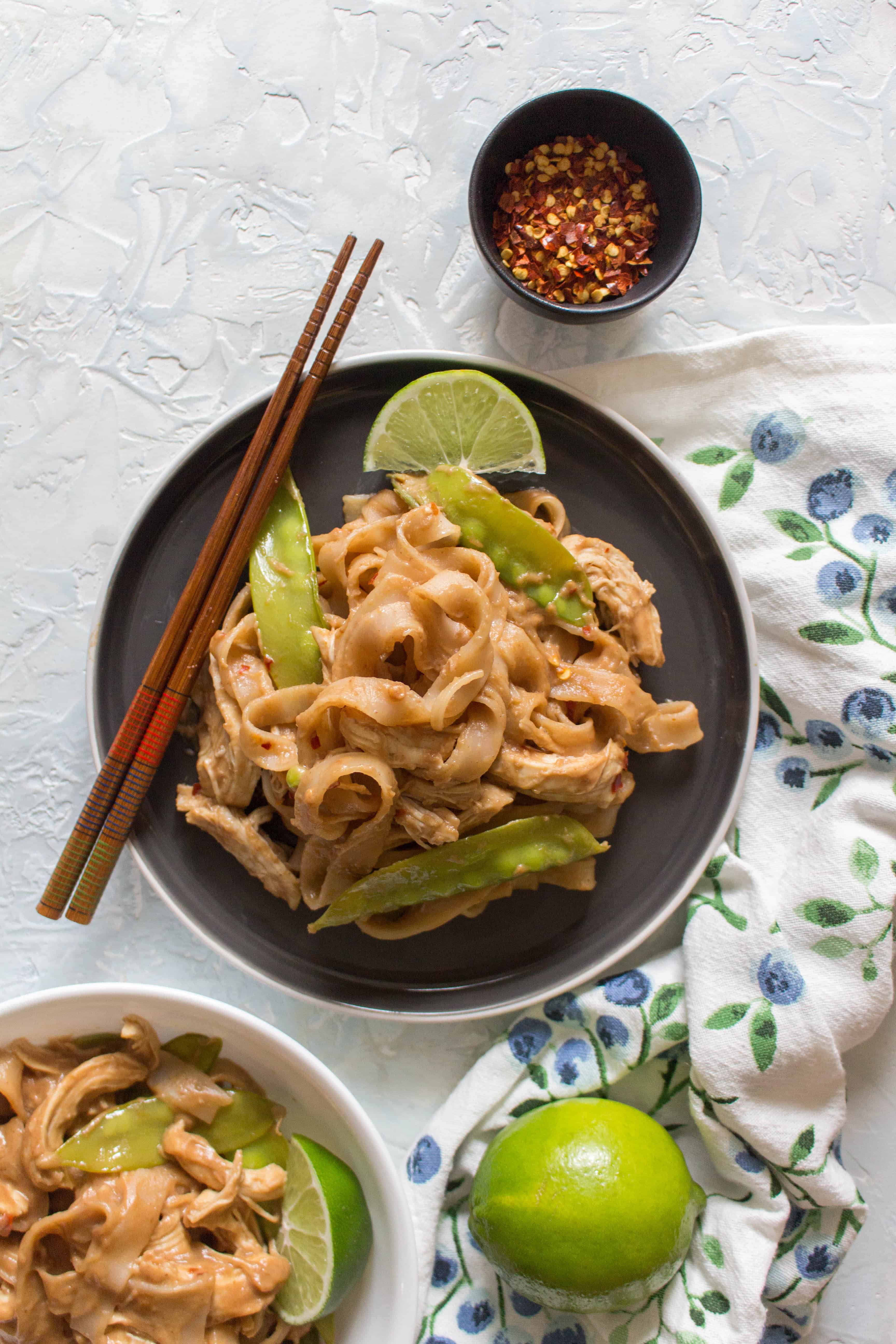 This Healthy Instant Pot Thai Peanut Chicken and Noodles Recipe is the perfect weeknight dinner! This Thai Peanut Chicken and Noodle recipe is so quick, easy, and versatile you’re going to want to make all the time! Non-Instant Pot instructions are down below if you don't have an Instant Pot! Video down below!