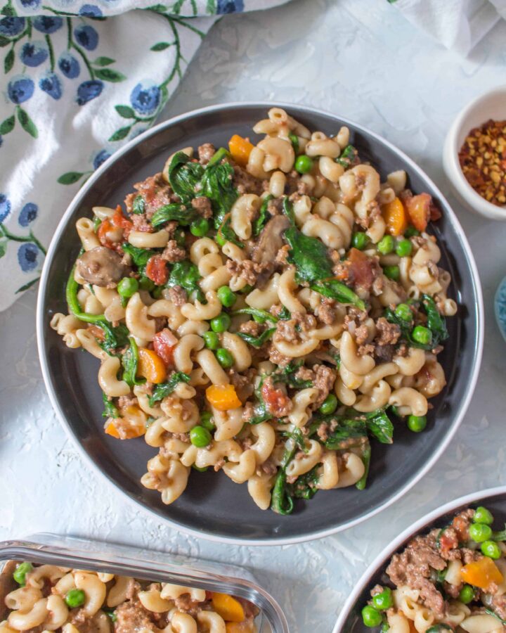 Looking for a delicious healthier homemade alternative to Hamburger Helper? This Instant Pot Cheeseburger Pasta is a yummy one-pot recipe inspired by Hamburger Helper! With some vegetables snuck in, this homemade hamburger helper will have you ditching that box! Non Instant Pot instructions included!