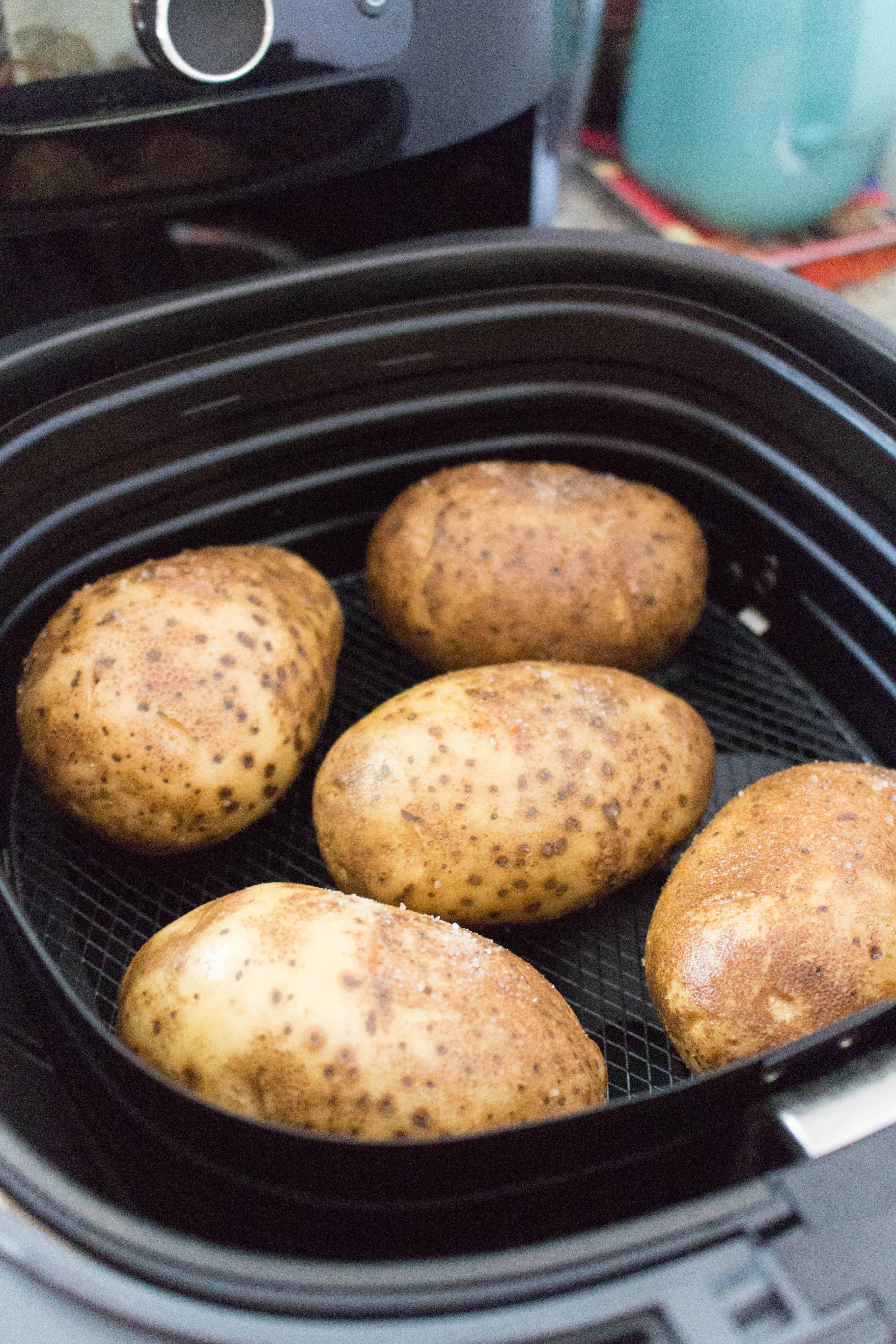The perfect side dish for a holiday meal or any meal, this airfryer baked potato recipe will have you making flawless baked potatoes every time! 