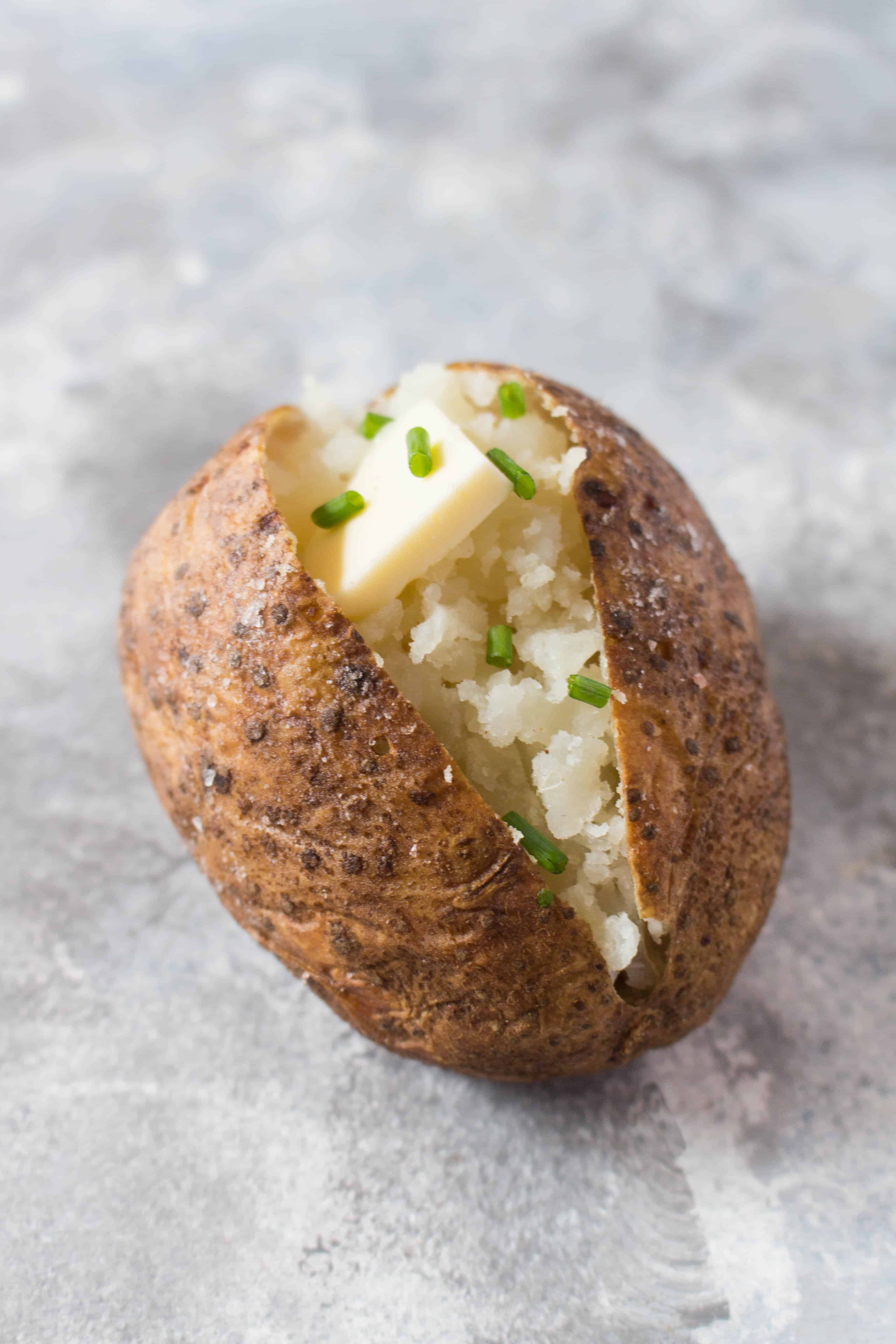 The perfect side dish for a holiday meal or any meal, this airfryer baked potato recipe will have you making flawless baked potatoes every time! 