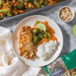 Skip the take out and make this easy Sheet Pan Thai Peanut Chicken as a weeknight dinner or as a meal prep for the week!