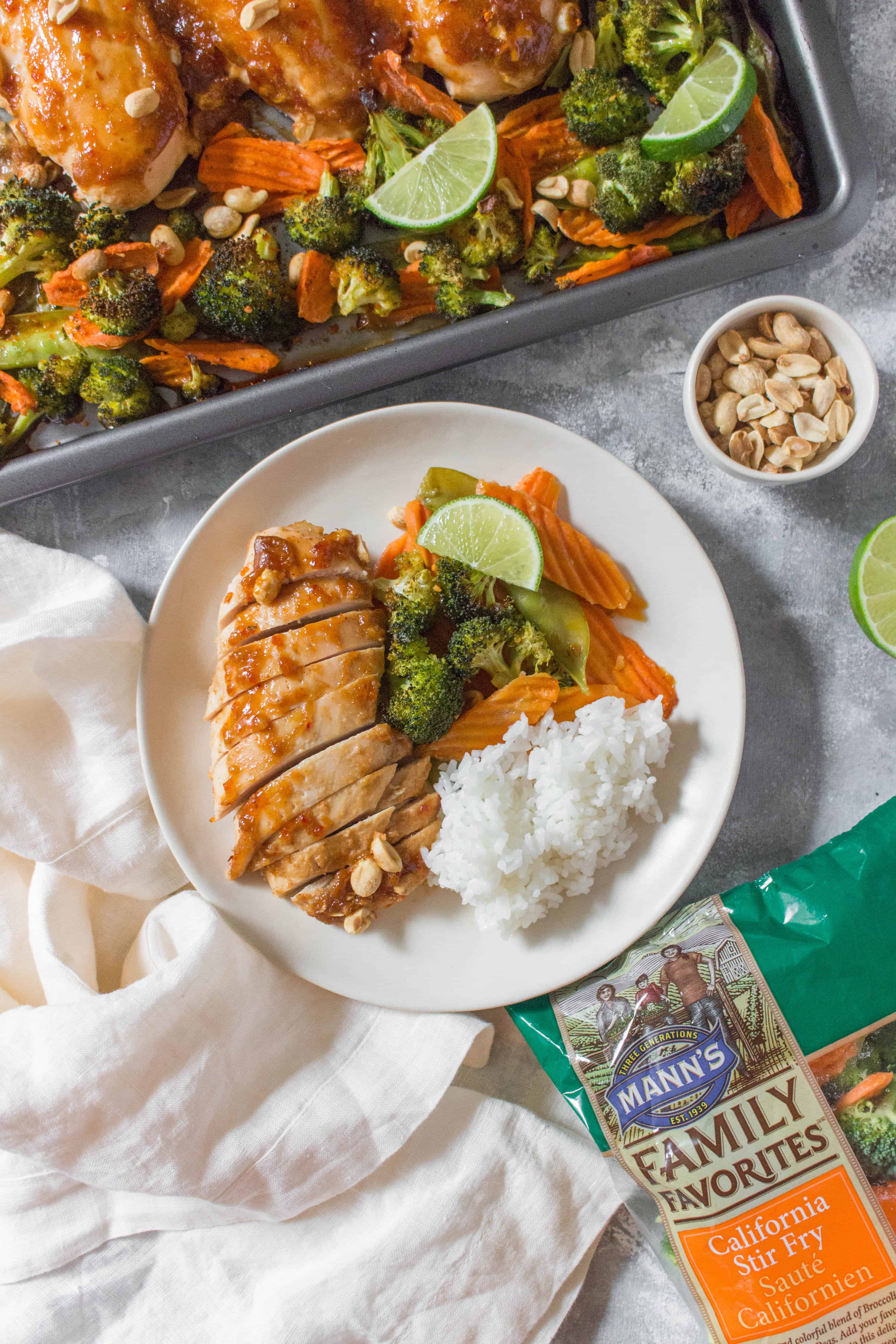 Skip the take out and make this easy Sheet Pan Thai Peanut Chicken as a weeknight dinner or as a meal prep for the week!