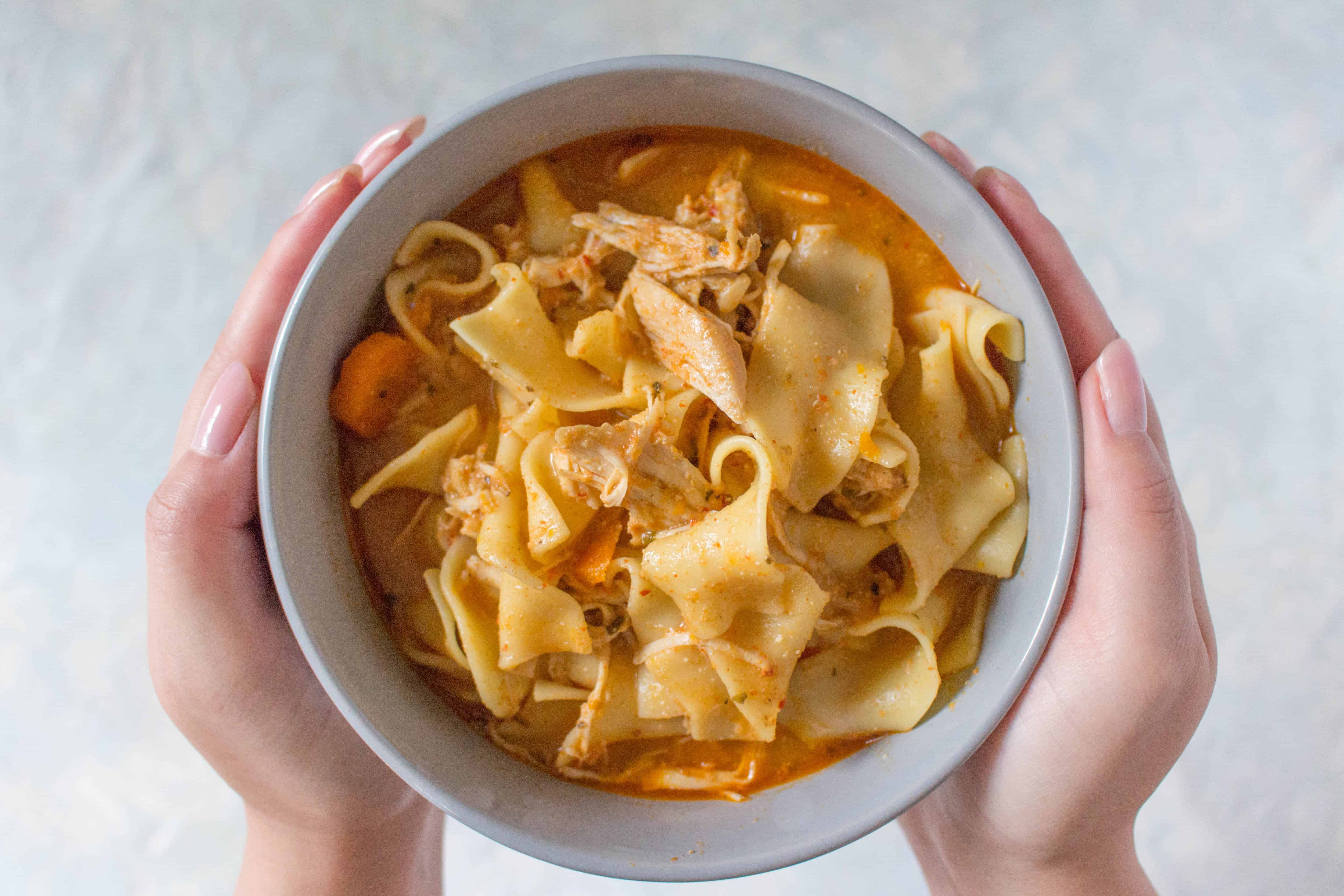 This Instant Pot Korean Inspired Spicy Chicken Noodle Soup is the perfect bowl of comfort to warm up to on a cold winter day! 