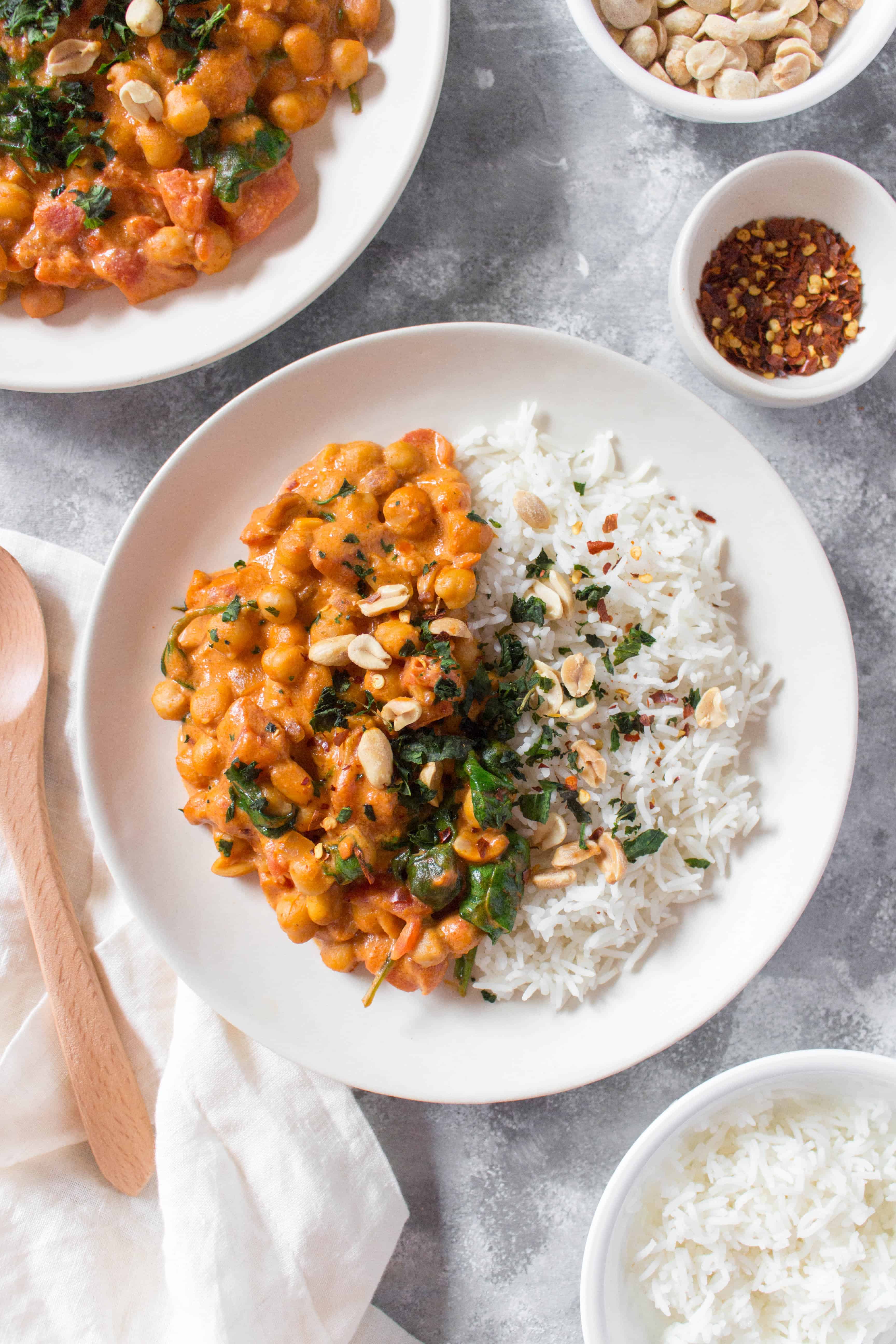 Looking for something to warm you inside and out made with a budget friendly superfood? Try this Spicy Peanut Chickpea Curry, it packs a punch!