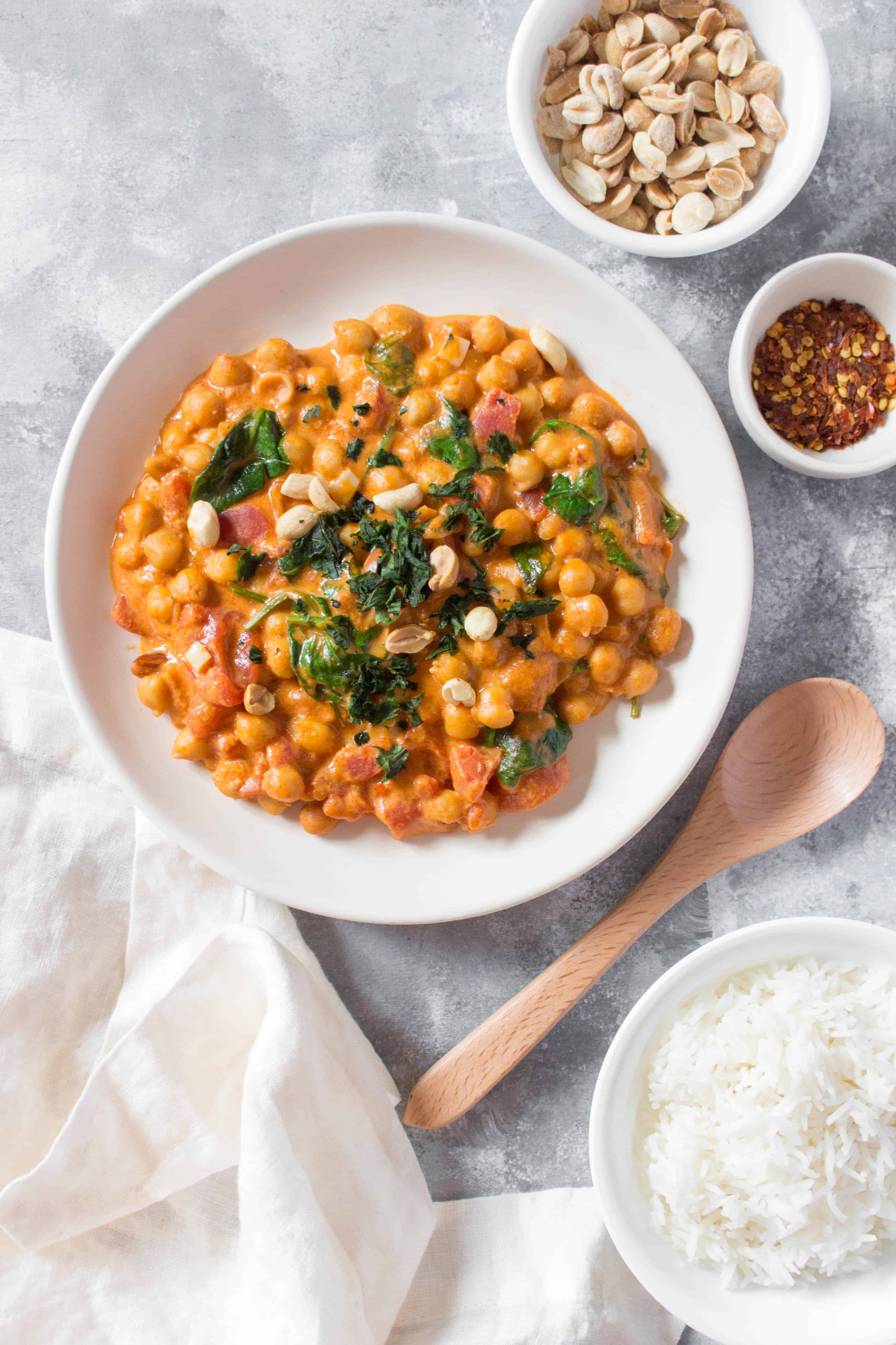 Looking for something to warm you inside and out made with a budget friendly superfood? Try this Spicy Peanut Chickpea Curry!