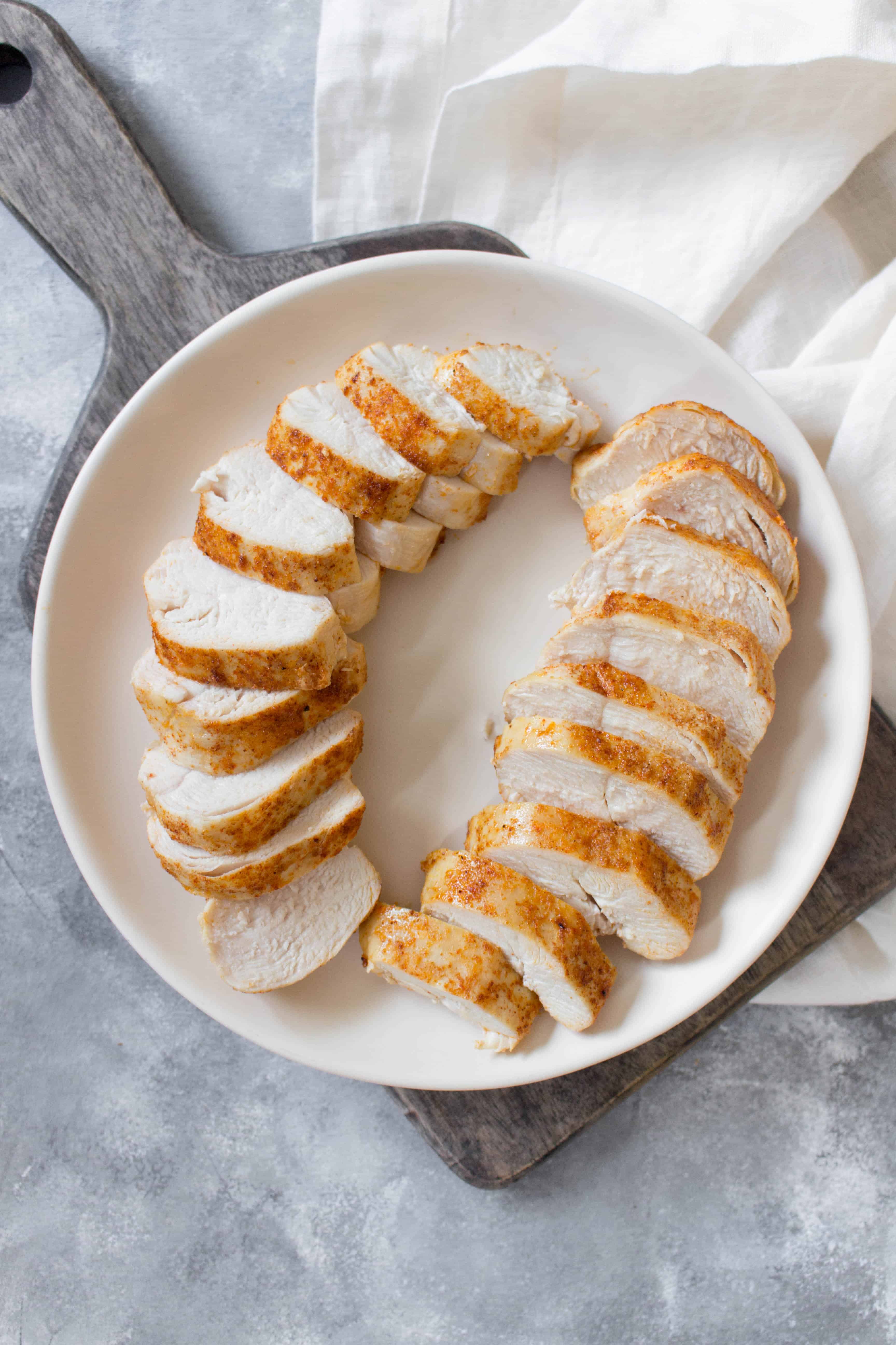 Curious as to how to make chicken breasts in your air fryer? Here is my basic air fryer chicken breasts recipe that takes under 15 minutes to make!