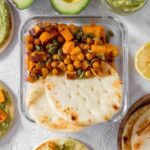 This Creamy Avocado Hummus with Roasted Chickpeas and Sweet Potato on Mini Pitas are the perfect grab and go lunch.