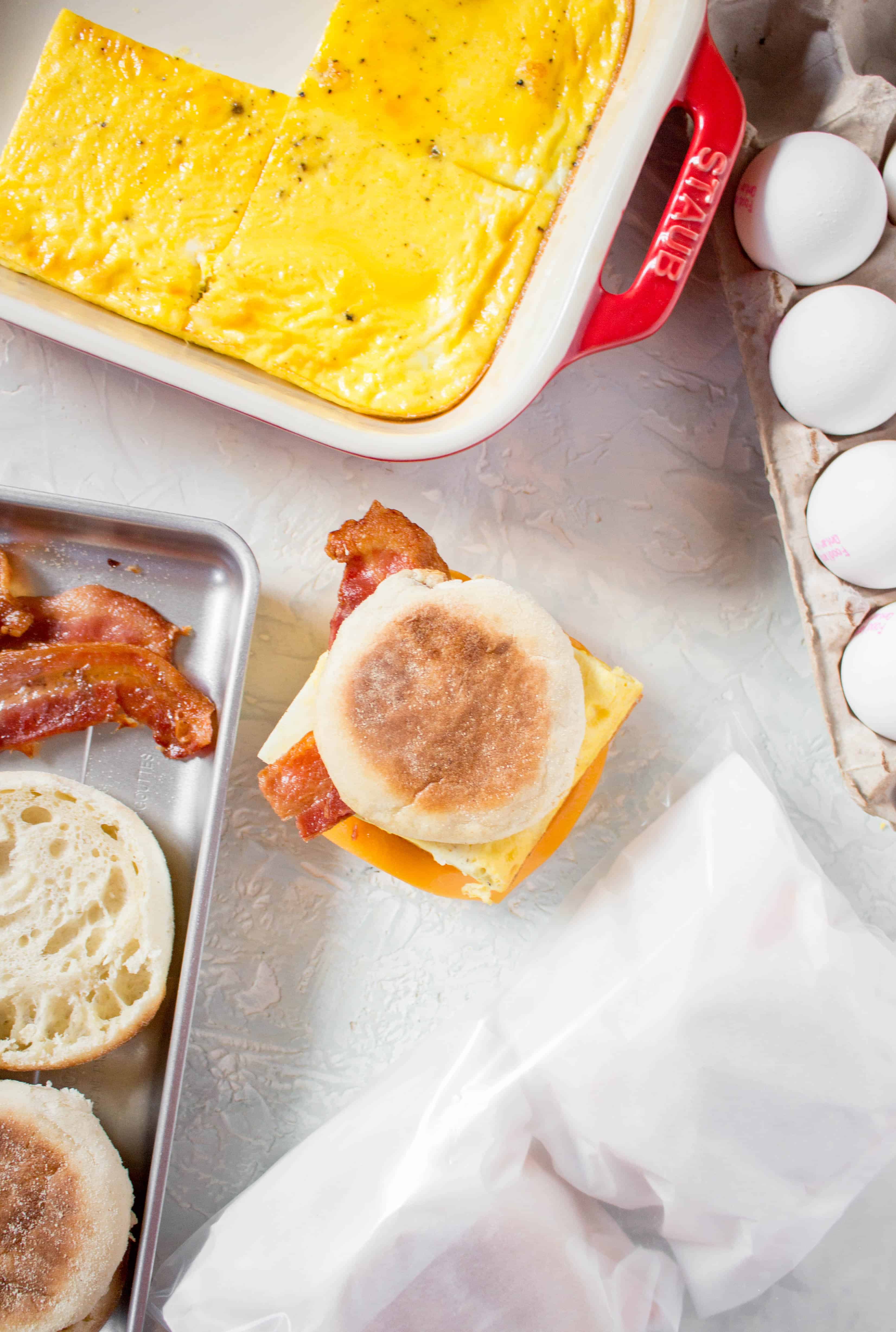 Skip the drive thru in the morning and make your own freezer friendly breakfast egg sandwiches. Make a batch, freeze it, and have a sandwich for breakfast everyday!