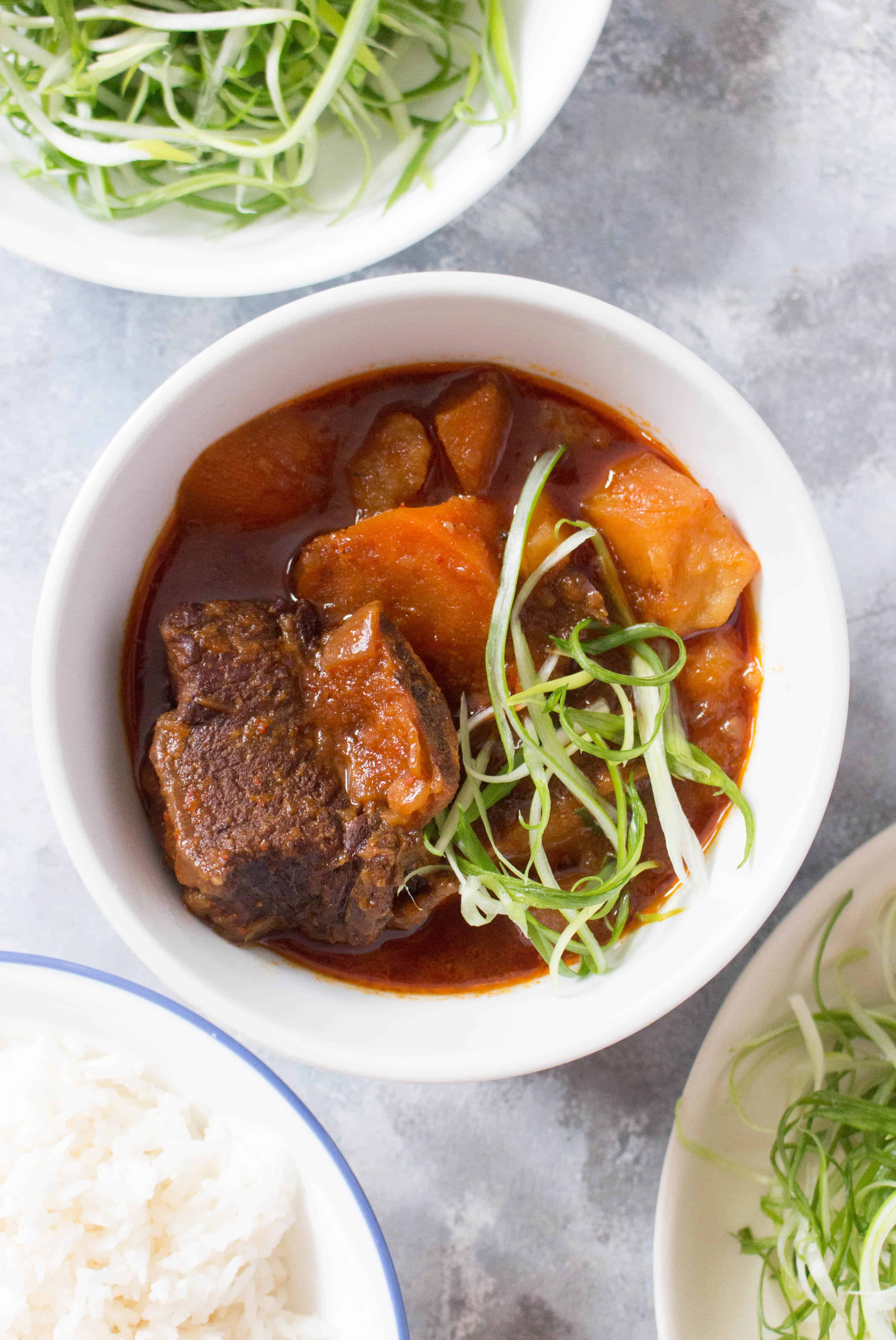 These spicy sweet but savoury Korean Instant Pot Beef Short Ribs are going to knock your socks off. It's such a cozy meal that you're going to want to make this again and again all winter.
