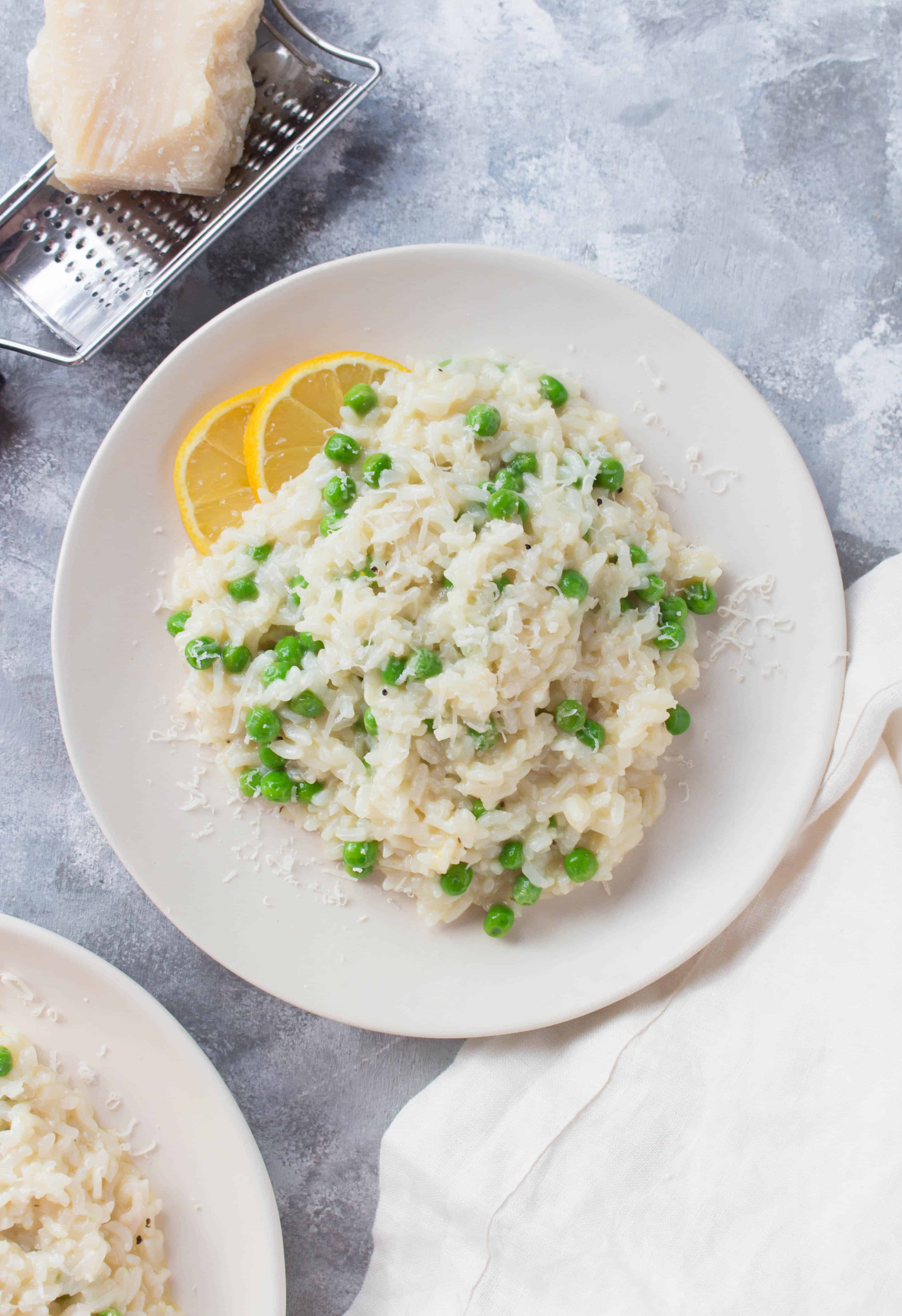 This Instant Pot Lemon Pea Risotto is a show stopper but secretly only takes a couple minutes to put together! Impress your guests by serving this pretty but simple dinner!