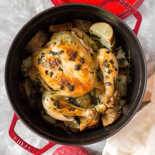 Crispy skin, delicious flavour, and oh so moist, this Garlic Herb Butter Roasted Chicken in a Dutch Oven is going to have you drooling!
