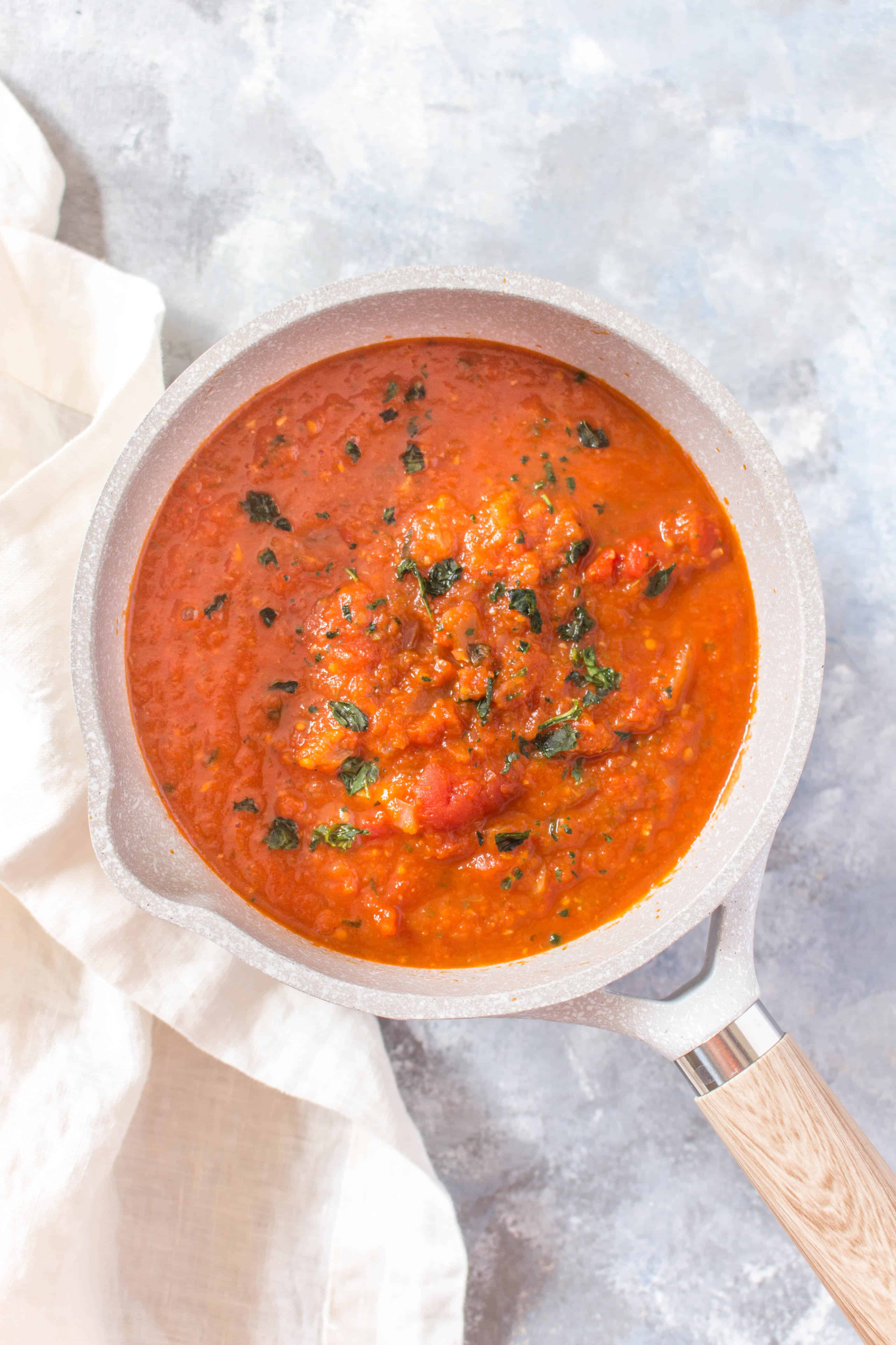 Make this basic homemade marinara sauce in a jiffy. It's rich in flavour, easy to make, and has no added sugar.