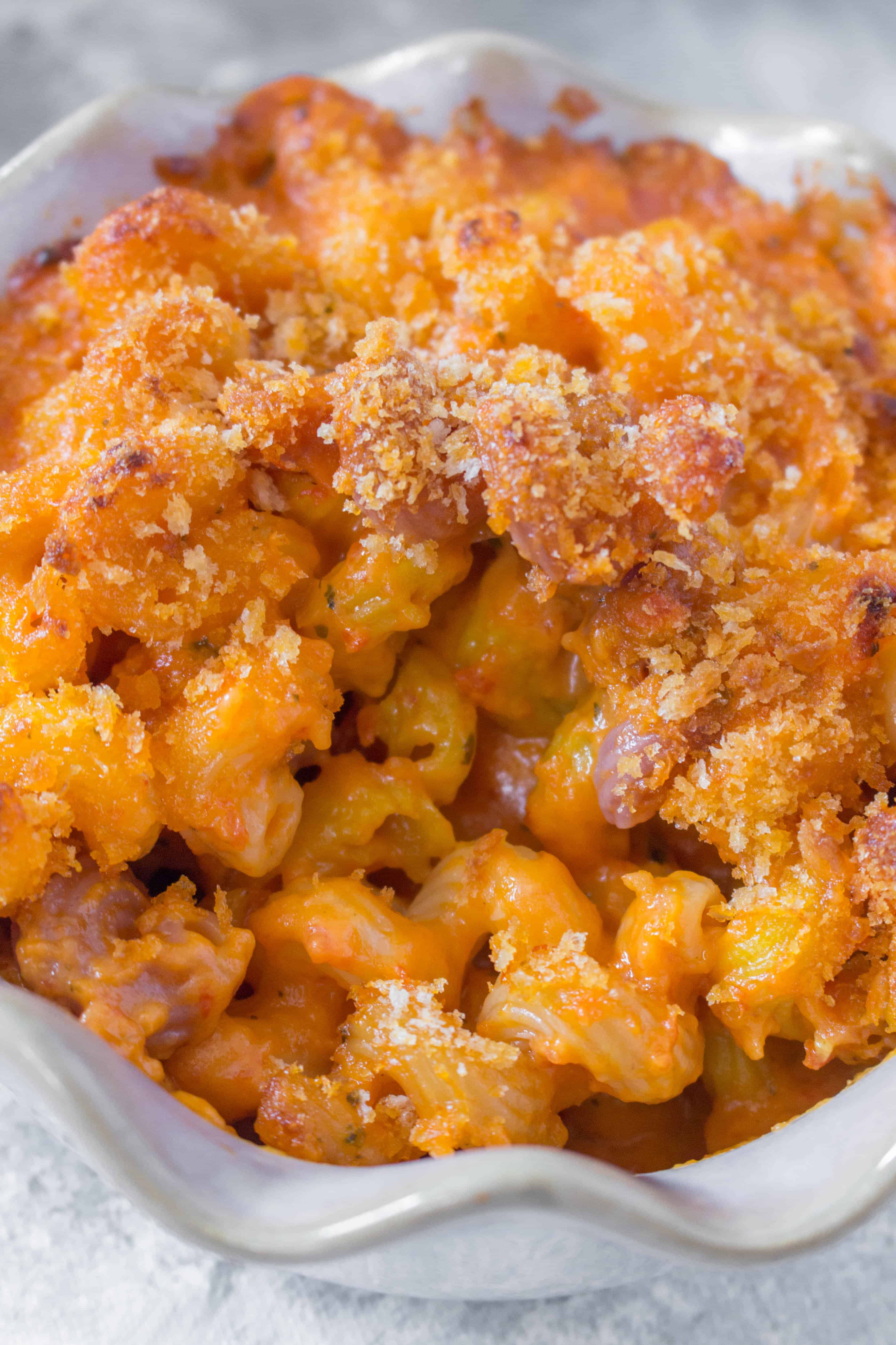 Change up your regular mac and cheese with this delicious creamy Baked Tomato Soup Mac and Cheese!