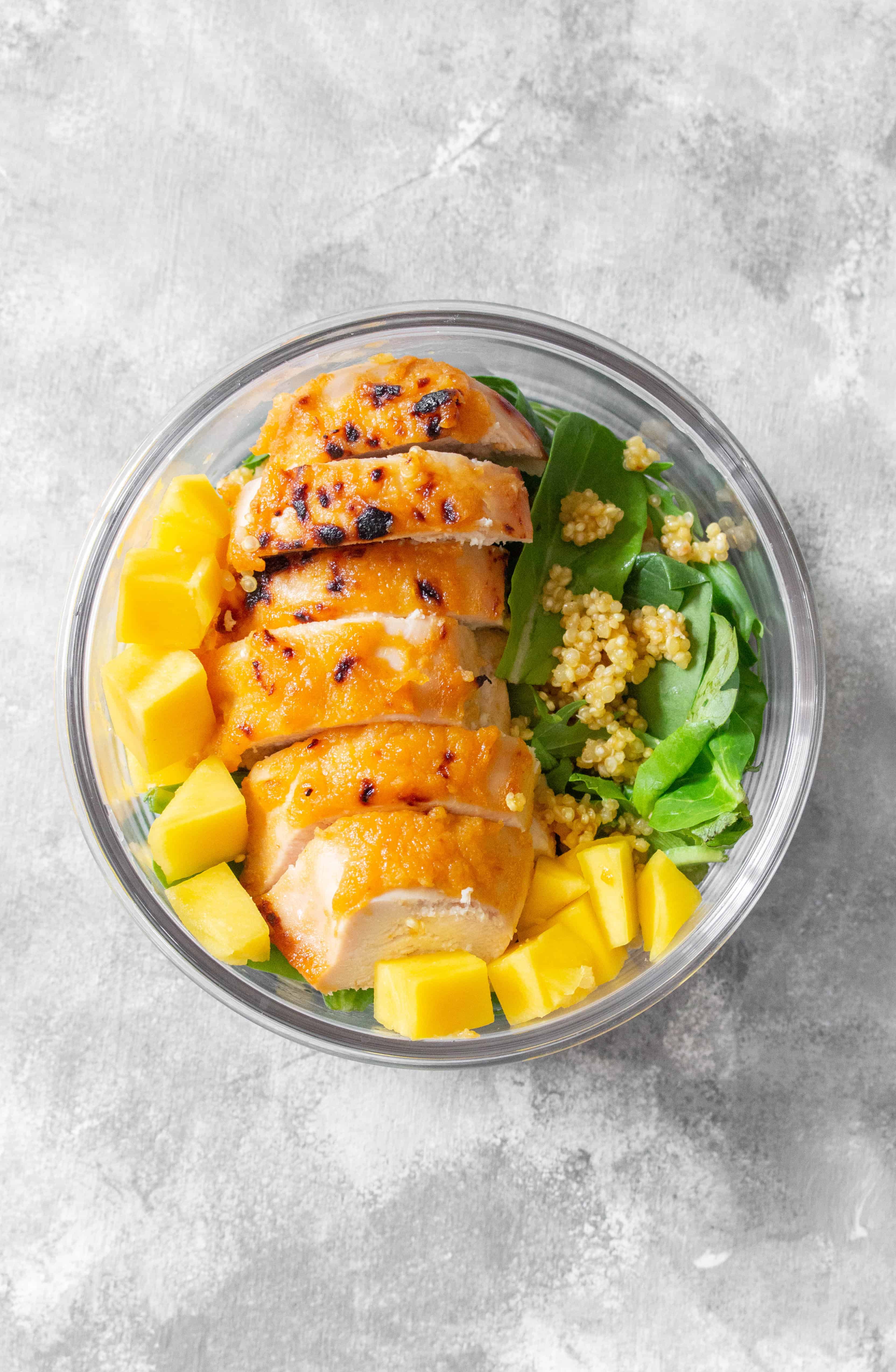 This easy Mango Chili Lime Chicken meal prep is coated with a sweet and spicy marinade. Delicious hot or cold.