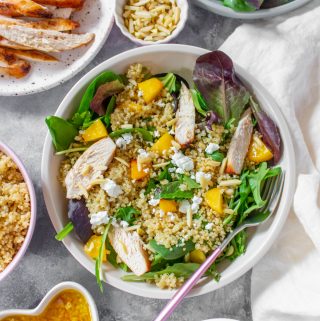 This Peach Quinoa Salad is the perfect cold lunch meal prep as well as being super easy to make for a large gathering! Look no further for a cold lunch idea than this sweet peachy salad.