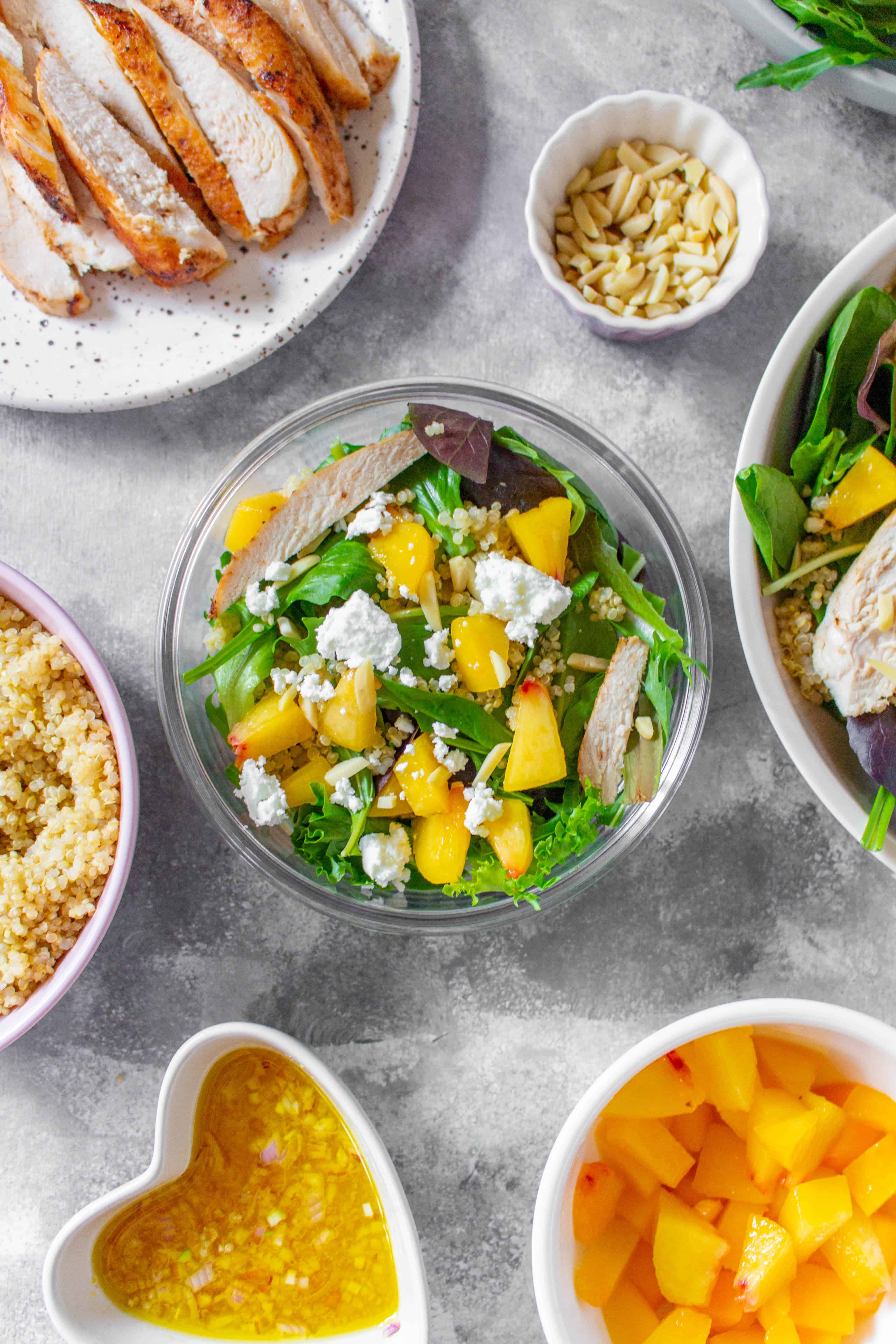 This Peach Quinoa Salad is the perfect cold lunch meal prep as well as being super easy to make for a large gathering! Look no further for a cold lunch idea than this sweet peachy salad.