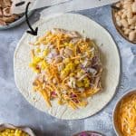Freezer Chicken Burritos are super handy to have in the freezer. Meal prep these lazy chicken burritos this weekend!