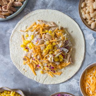 Freezer Chicken Burritos are super handy to have in the freezer. Meal prep these lazy chicken burritos this weekend!
