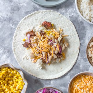 Freezer Steak Burritos are super handy to have in the freezer. Meal prep these lazy chicken burritos this weekend!