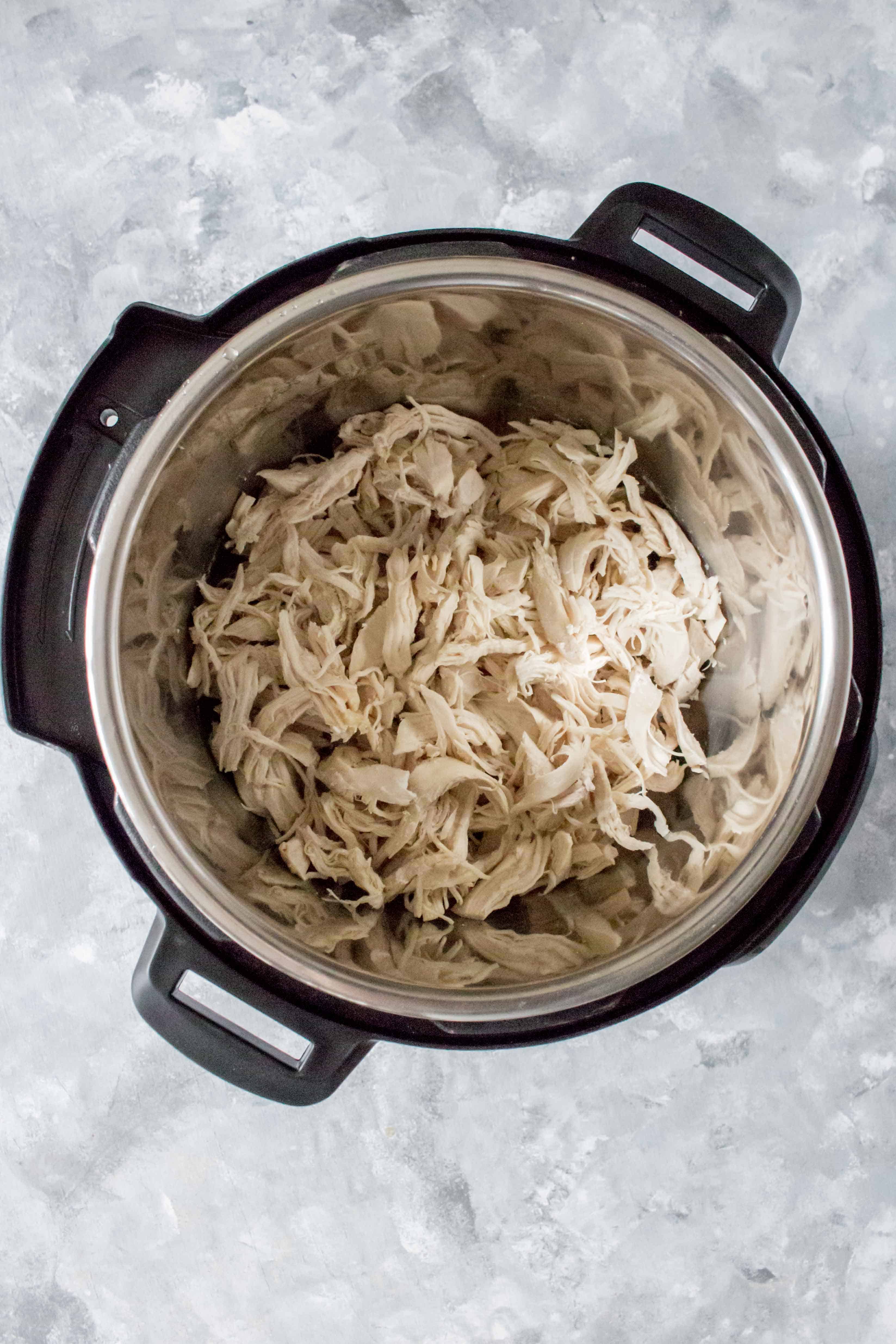 This Instant Pot Shredded Chicken is perfectly moist, tender, and easy to make! Use this shredded chicken for your meal prep, freeze for later, or as an addition to any meal you've got planned for the week!