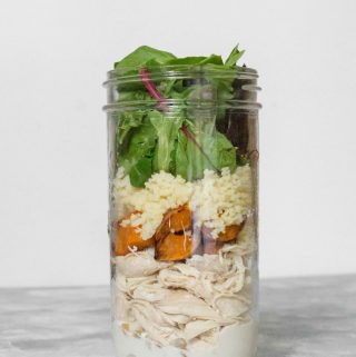 This Summer Couscous Chicken Mason Jar Salad is super easy to make and will make your work lunches much more exciting!