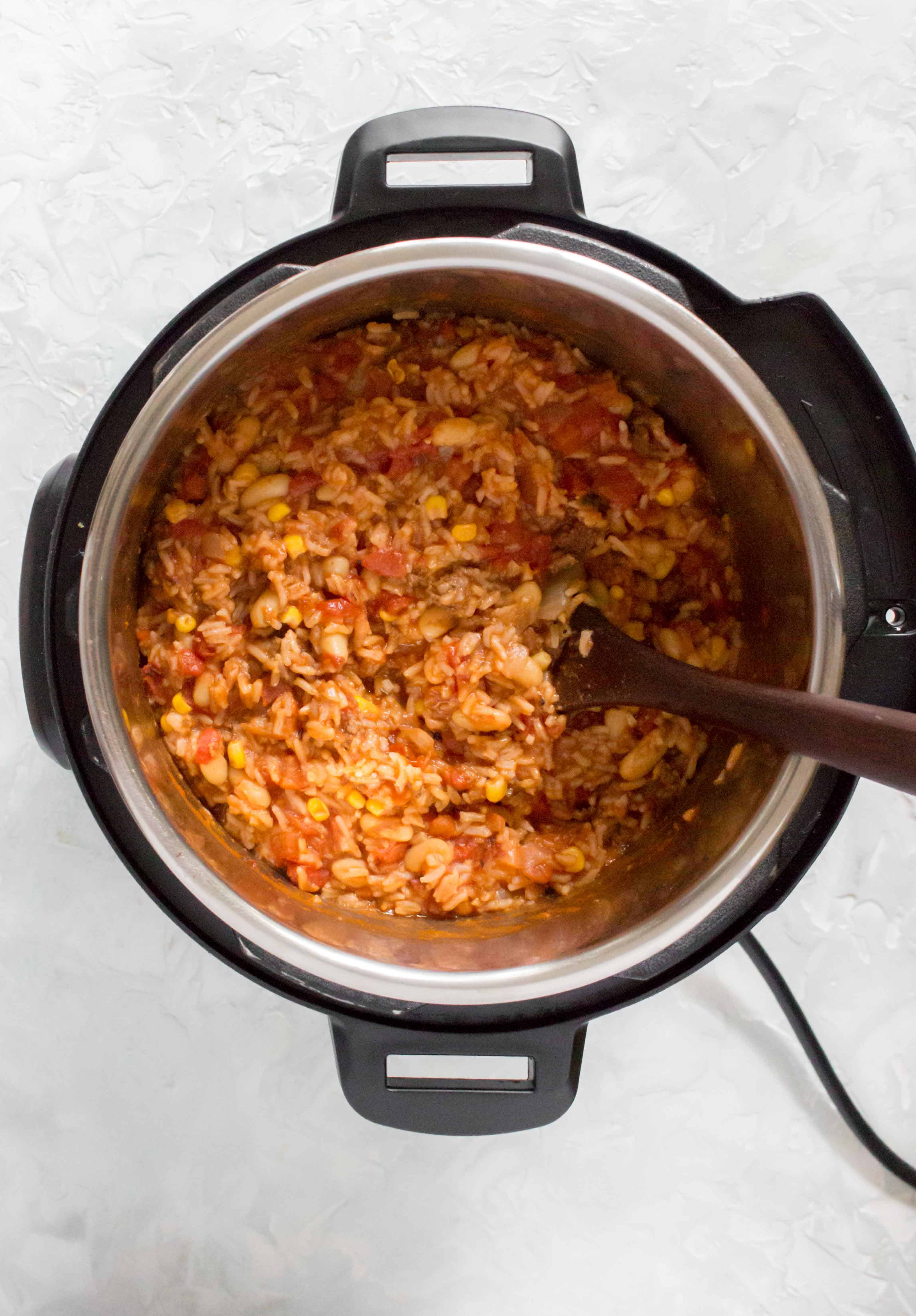 This Instant Pot Spicy Beef and Rice is the perfect meal prep for the week or as a last minute weeknight dinner!