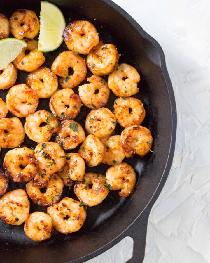 This Honey Garlic Lime Shrimp is perfectly pan seared, sweet and garlicky. Make this for your dinner or meal prep in under 20 minutes.