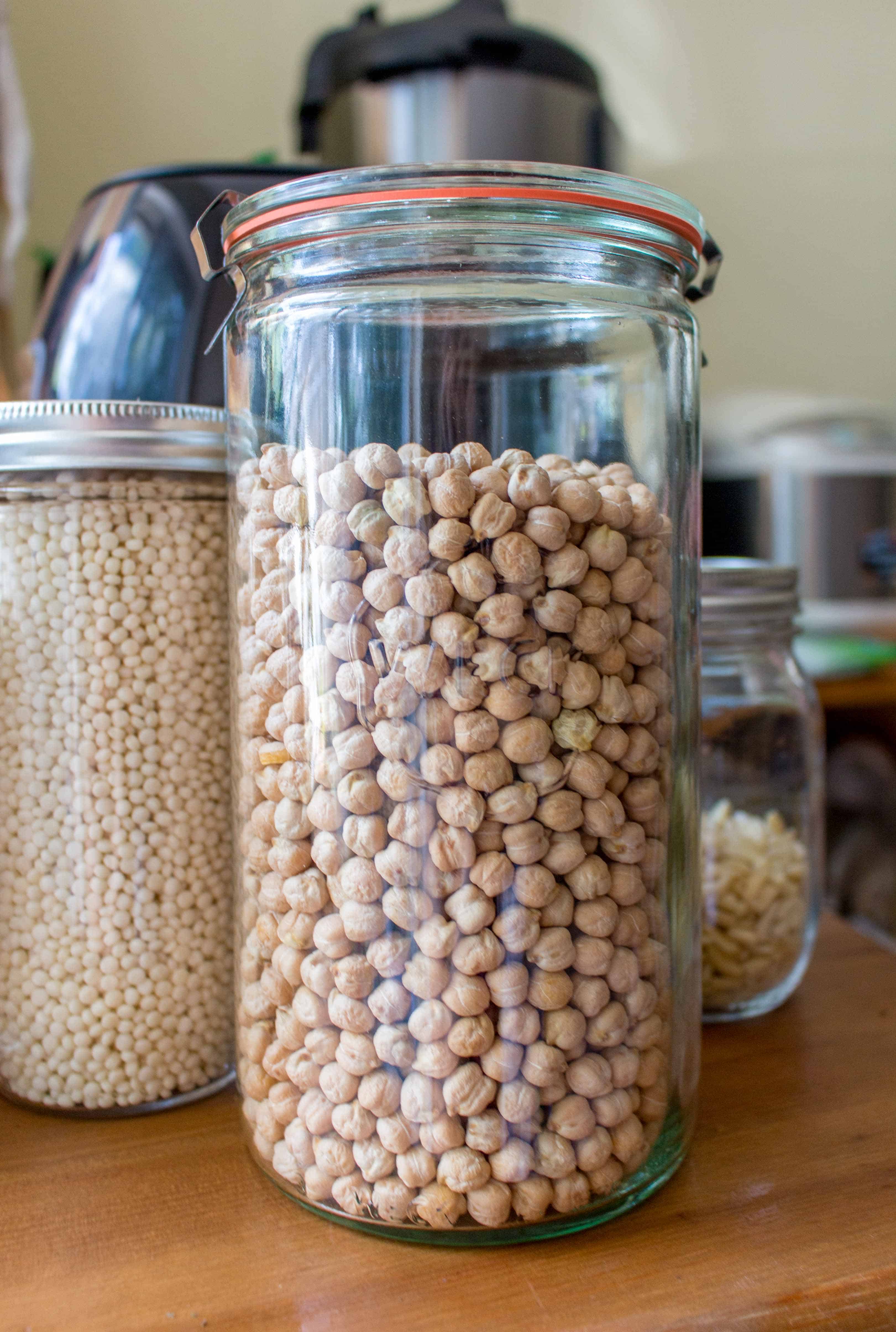 Hereâ€™s how to easily make chickpeas in an Instant Pot - a simple and quick method for cooking dried garbanzo beans in a pressure cooker!