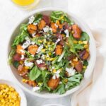 This Roasted Sweet Potato Salad with Corn and Bacon is the perfect salad for your next get together!