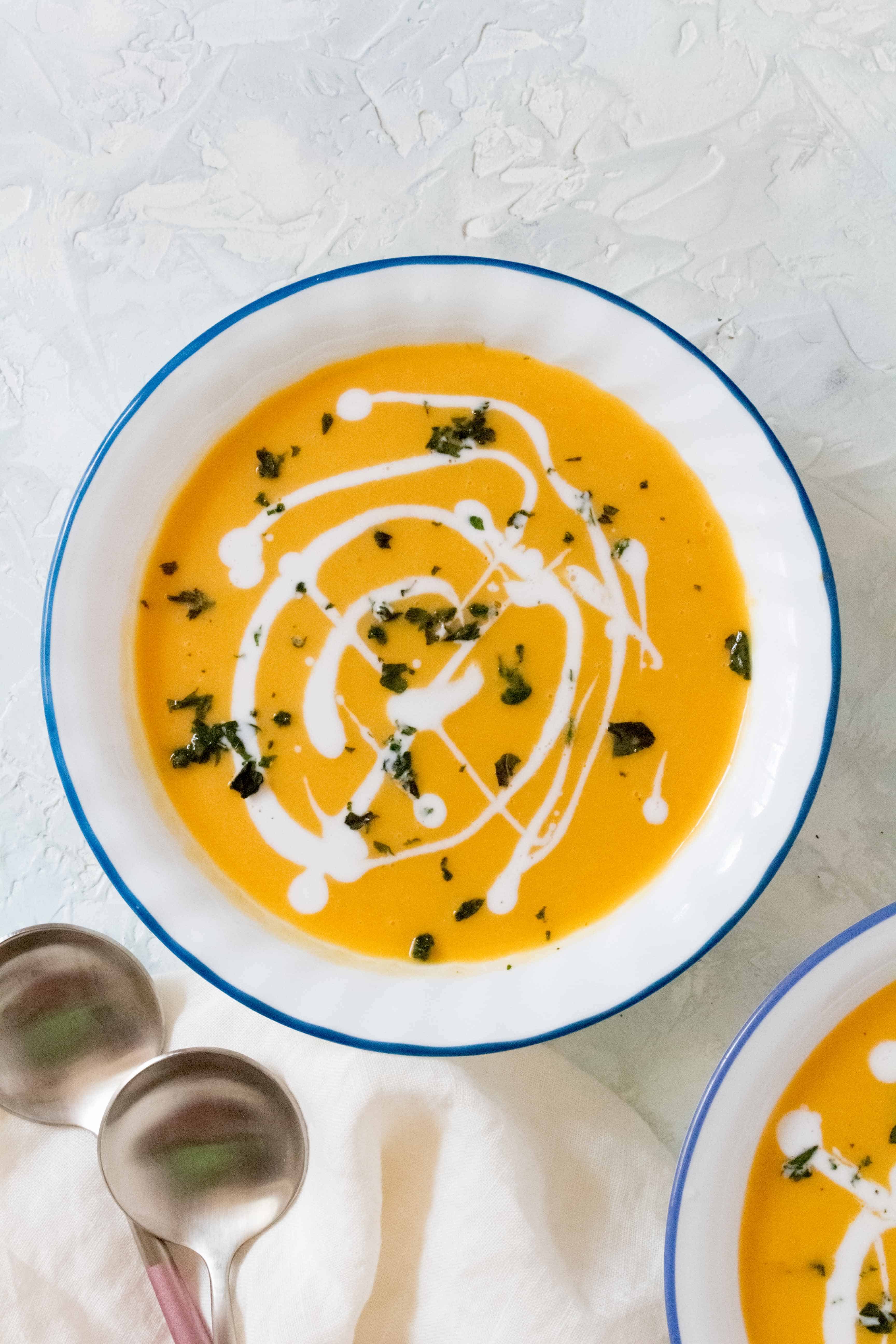 This Instant Pot Thai Carrot Sweet Potato Soup is the perfect mix of sweet with a hint of heat. Super quick and easy to make, you're going to want to make this regularly!