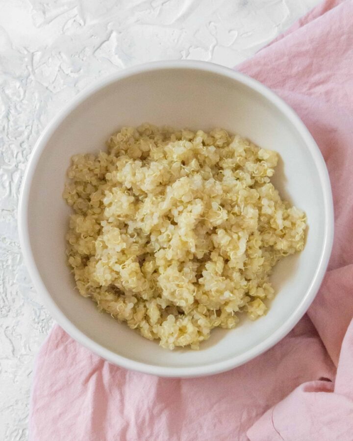 A staple in my meal prep, here's how I make the perfect Instant Pot Quinoa! Fluffy, quick, and fail-proof!