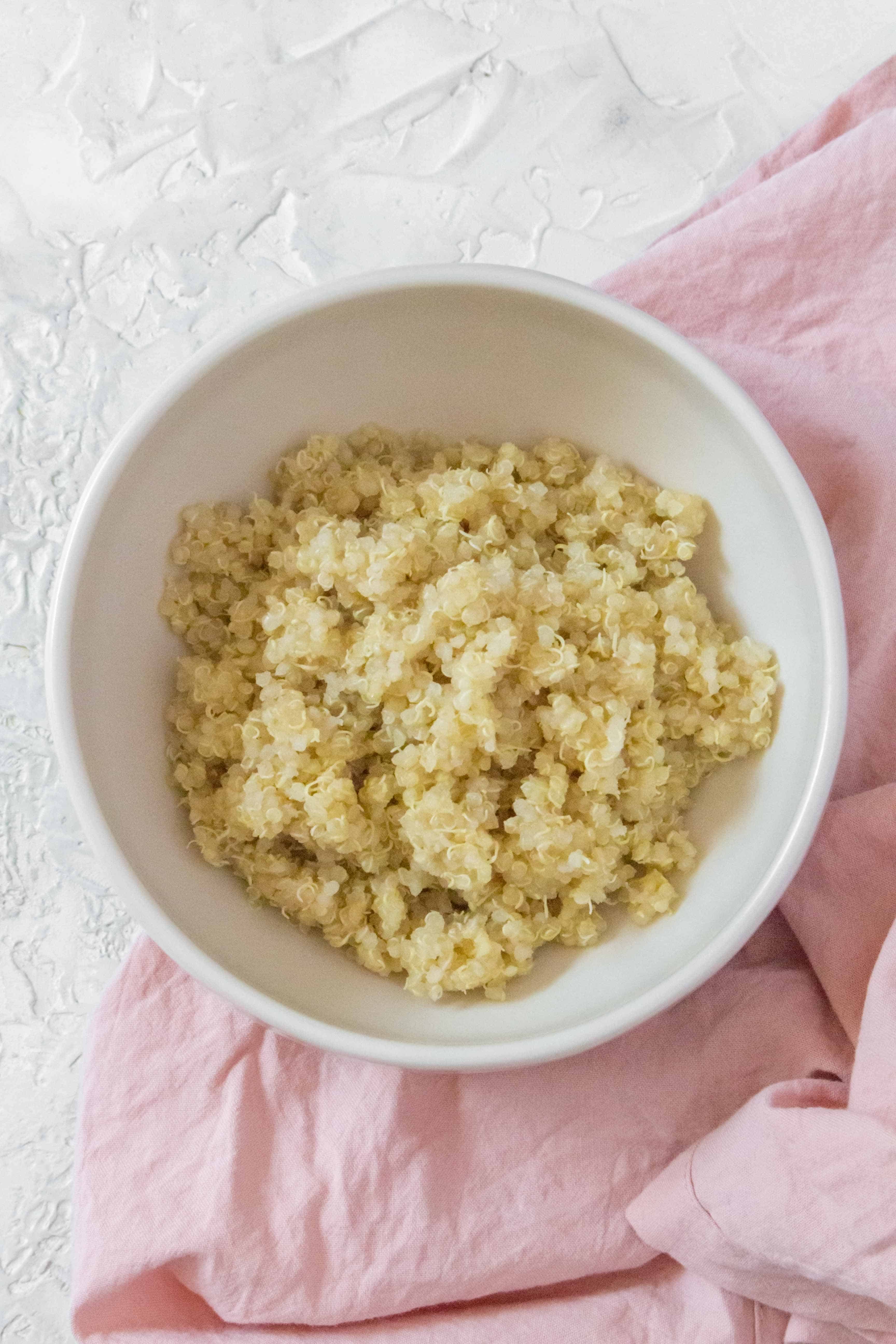 A staple in my meal prep, here's how I make the perfect Instant Pot Quinoa! Fluffy, quick, and fail-proof!