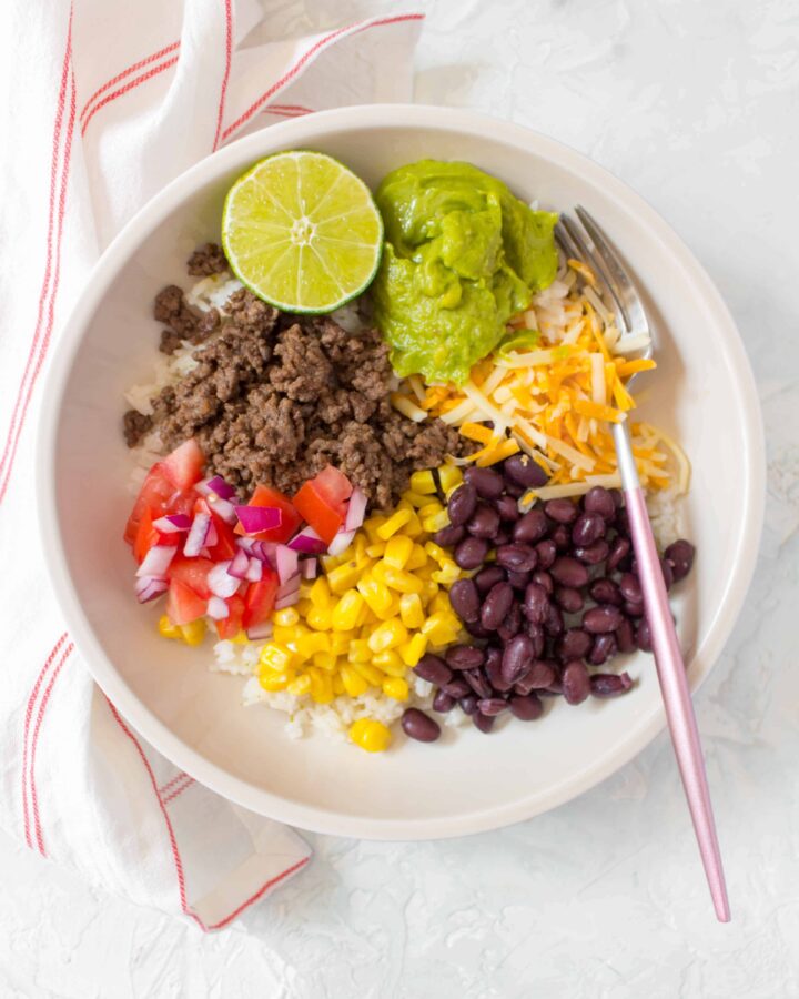 This easy and healthy Taco Bowl Meal Prep is going to become a staple in your meal prep rotation! Simple, filling, and delicious! 