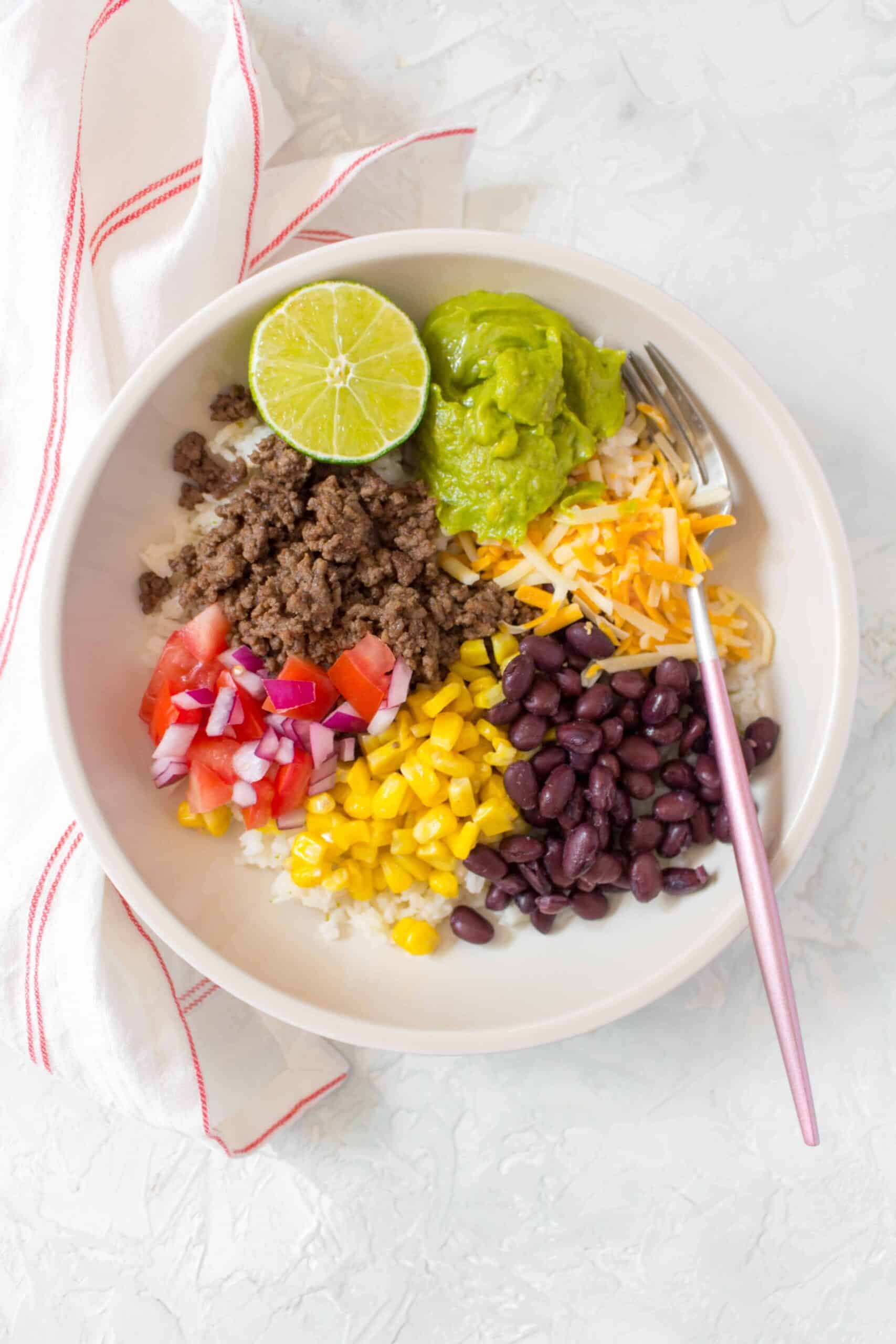 This easy and healthy Taco Bowl Meal Prep is going to become a staple in your meal prep rotation! Simple, filling, and delicious! 