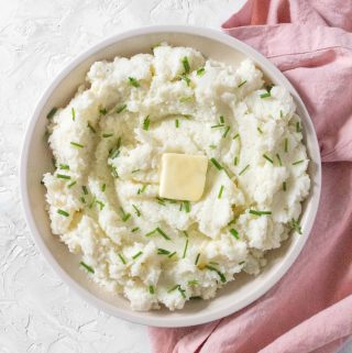 Easy peasy lemon squeezy, this Instant Pot Mashed Cauliflower goes perfectly as a side dish for any meal!