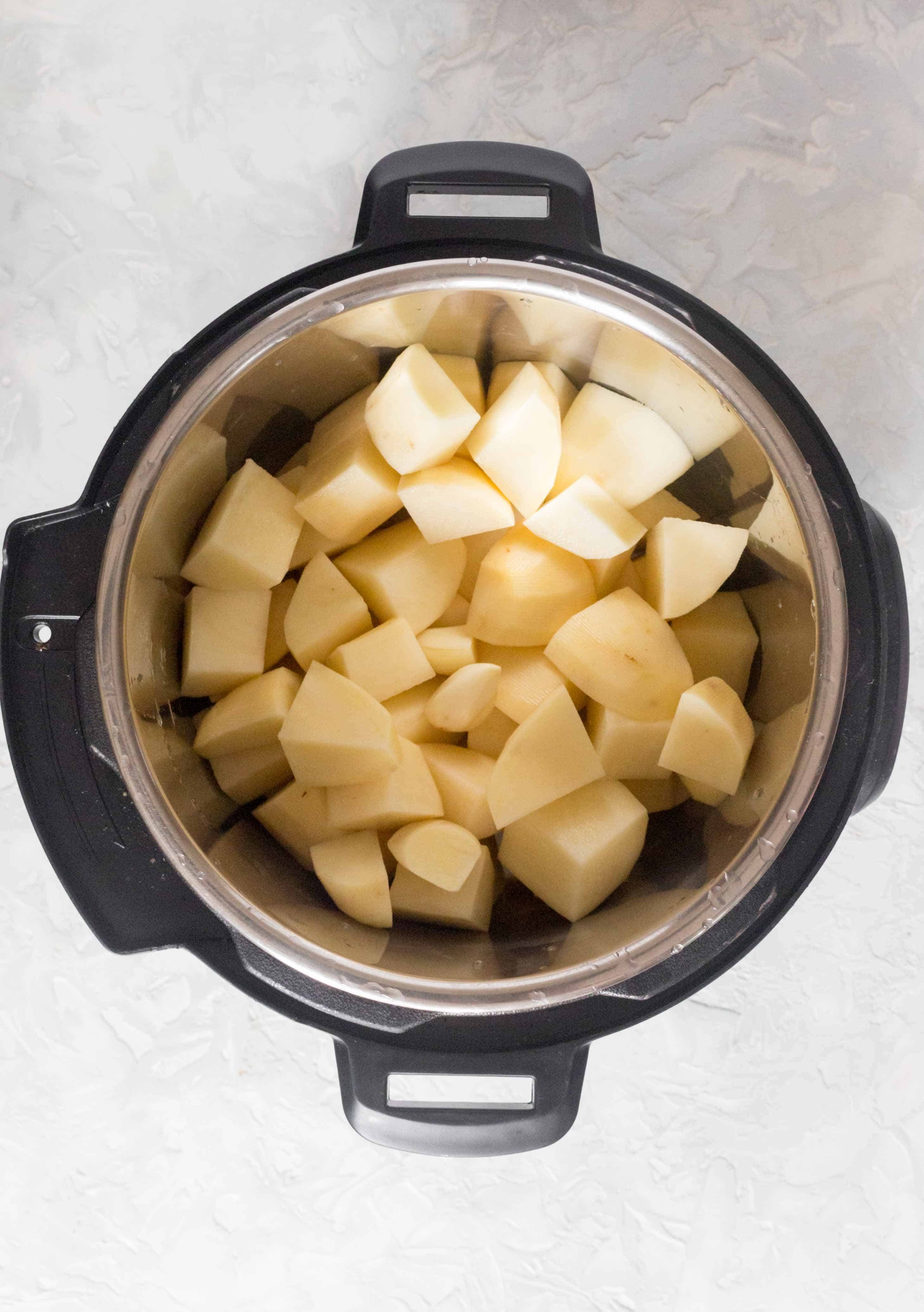 Diced potatoes in the pressure cooker.