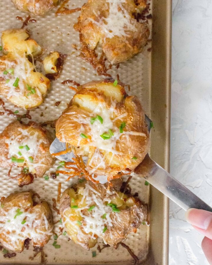 Crispy on the outside, fluffy on the inside, this Crispy Garlic Smashed Potatoes may just steal the show as the best side dish ever.