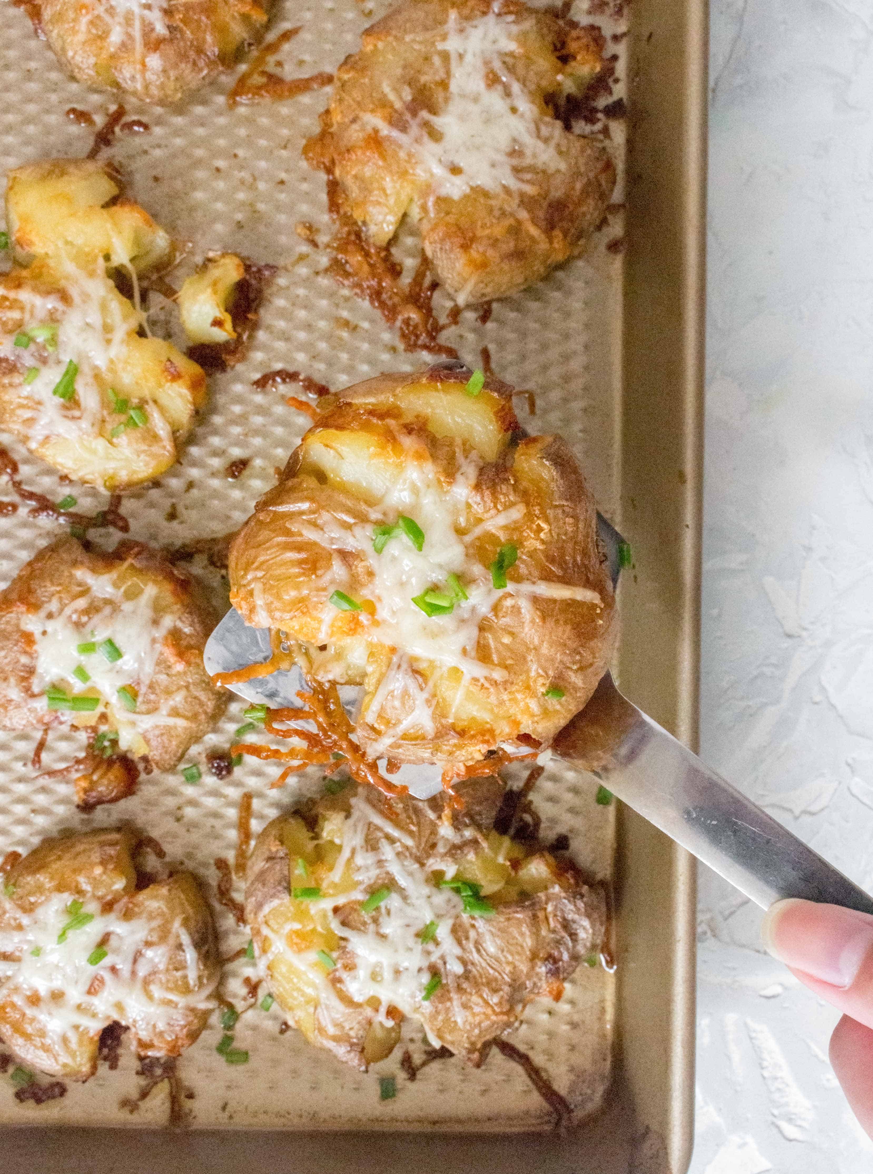 Crispy on the outside, fluffy on the inside, this Crispy Garlic Smashed Potatoes may just steal the show as the best side dish ever.