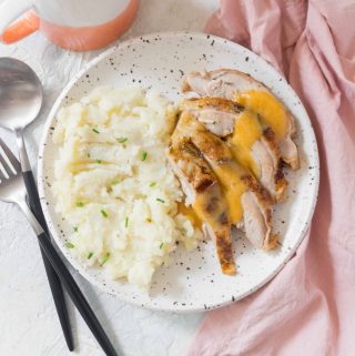 This Oven Roasted Turkey Thighs recipe is so simple to throw together - it's perfect if you want to skip cooking a whole turkey! Gravy instructions are included.