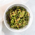 Want to spice up frozen edamame beans? Try this easy Air Fryer Parmesan Edamame to up your snack game! 