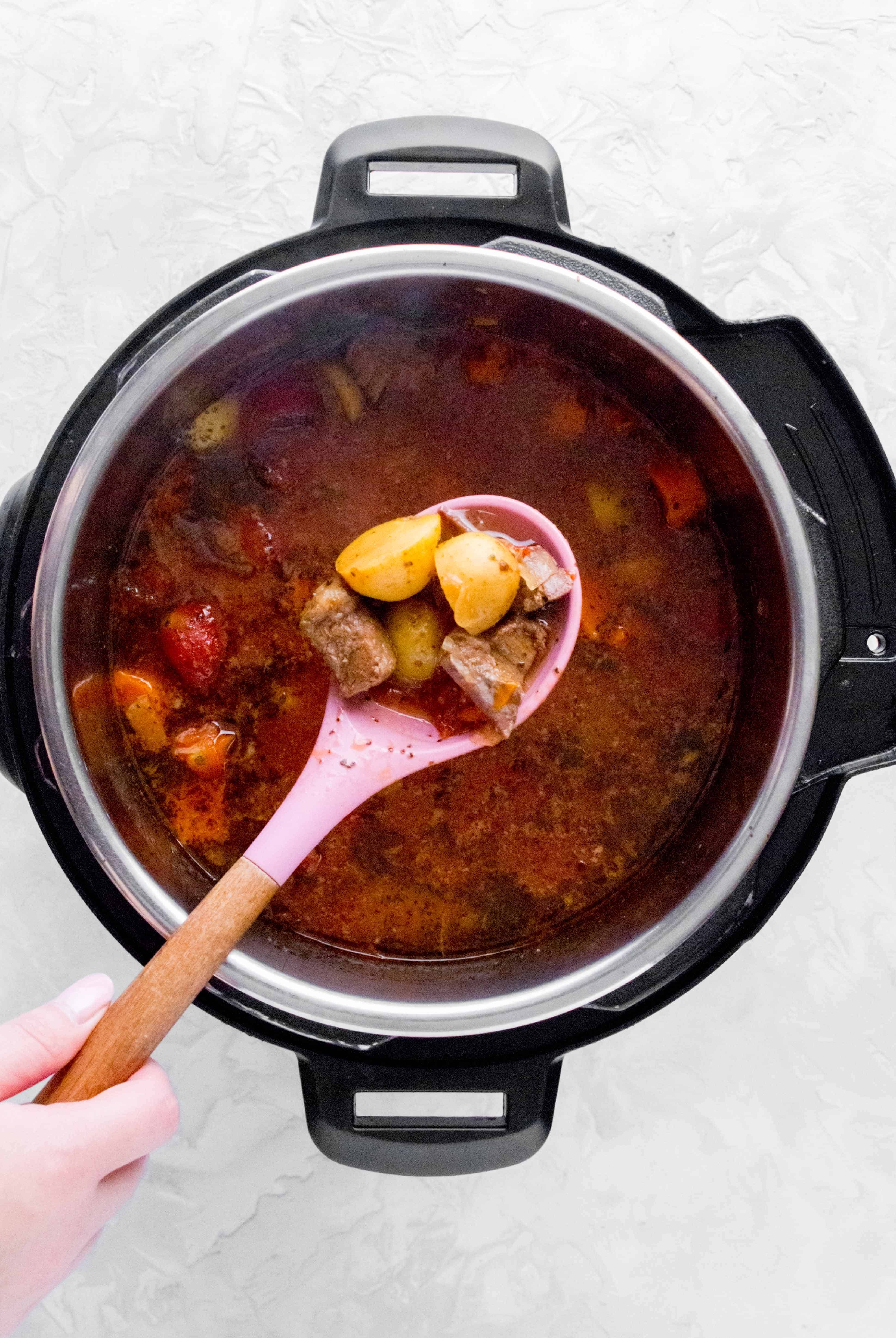 This classic hearty Beef and Tomato Soup warms you up inside out. A childhood favourite, this beef and tomato stew can be made with the Instant Pot, slow cooker, or on the stove top!